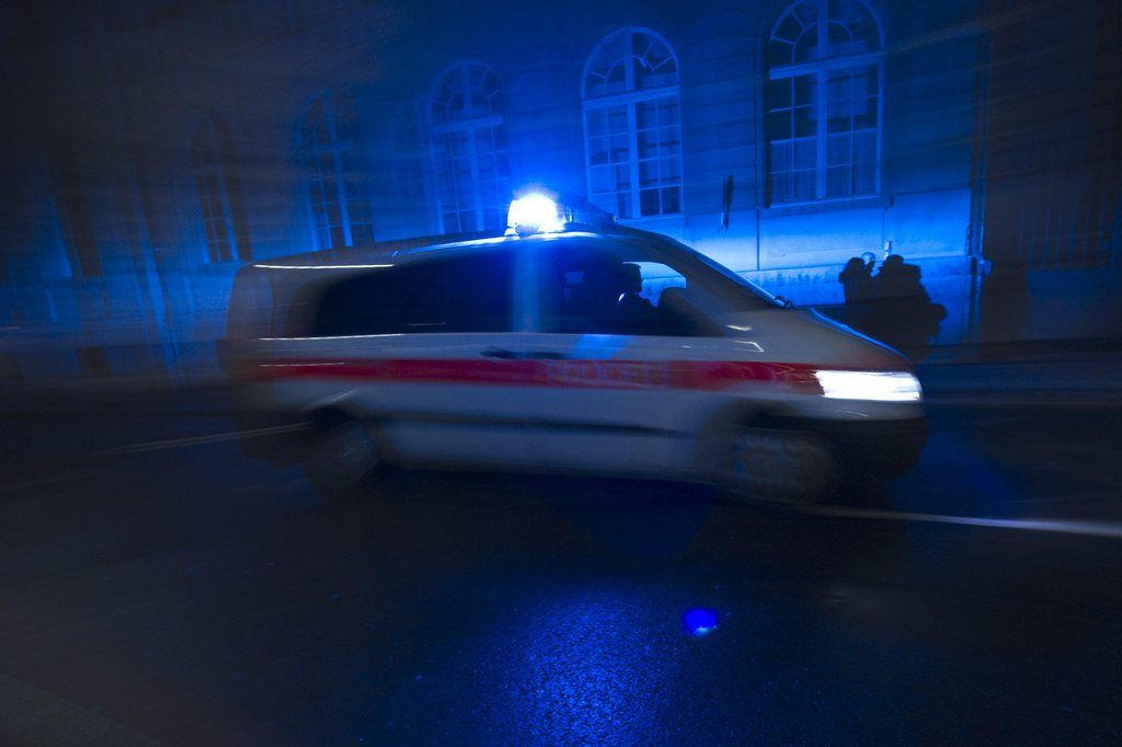 A police van rushes to an emergency minutes after midnight, in Bern, Switzerland, Friday, January 1st, 2010. (KEYSTONE/Alessandro della Valle).