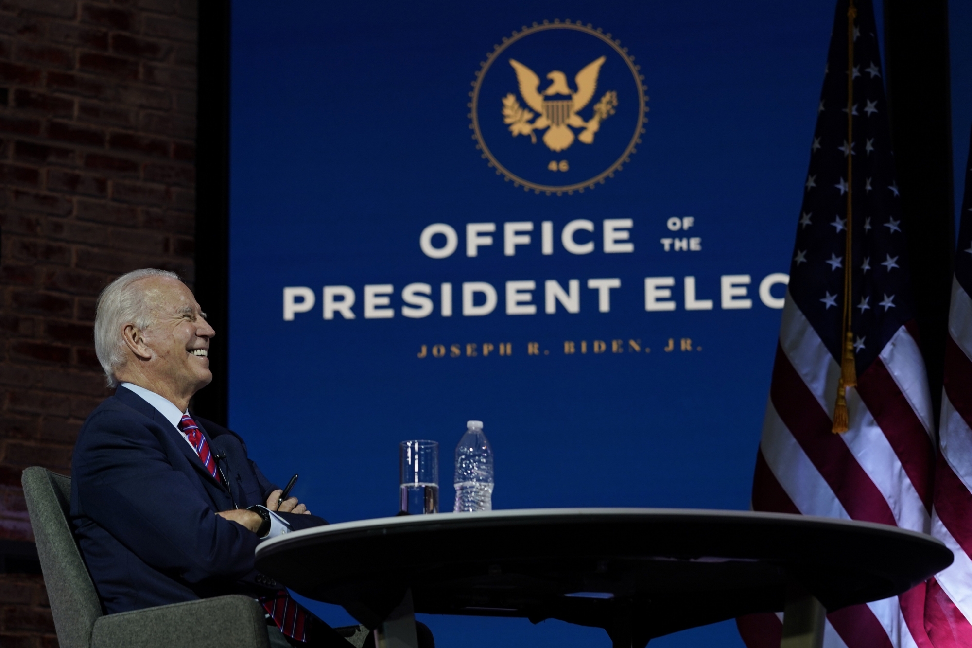 President-elect Joe Biden smiles as he meets virtually with the United States Conference of Mayors at The Queen theater Monday, Nov. 23, 2020, in Wilmington, Del. (AP Photo/Carolyn Kaster) Joe Biden ArcInfo