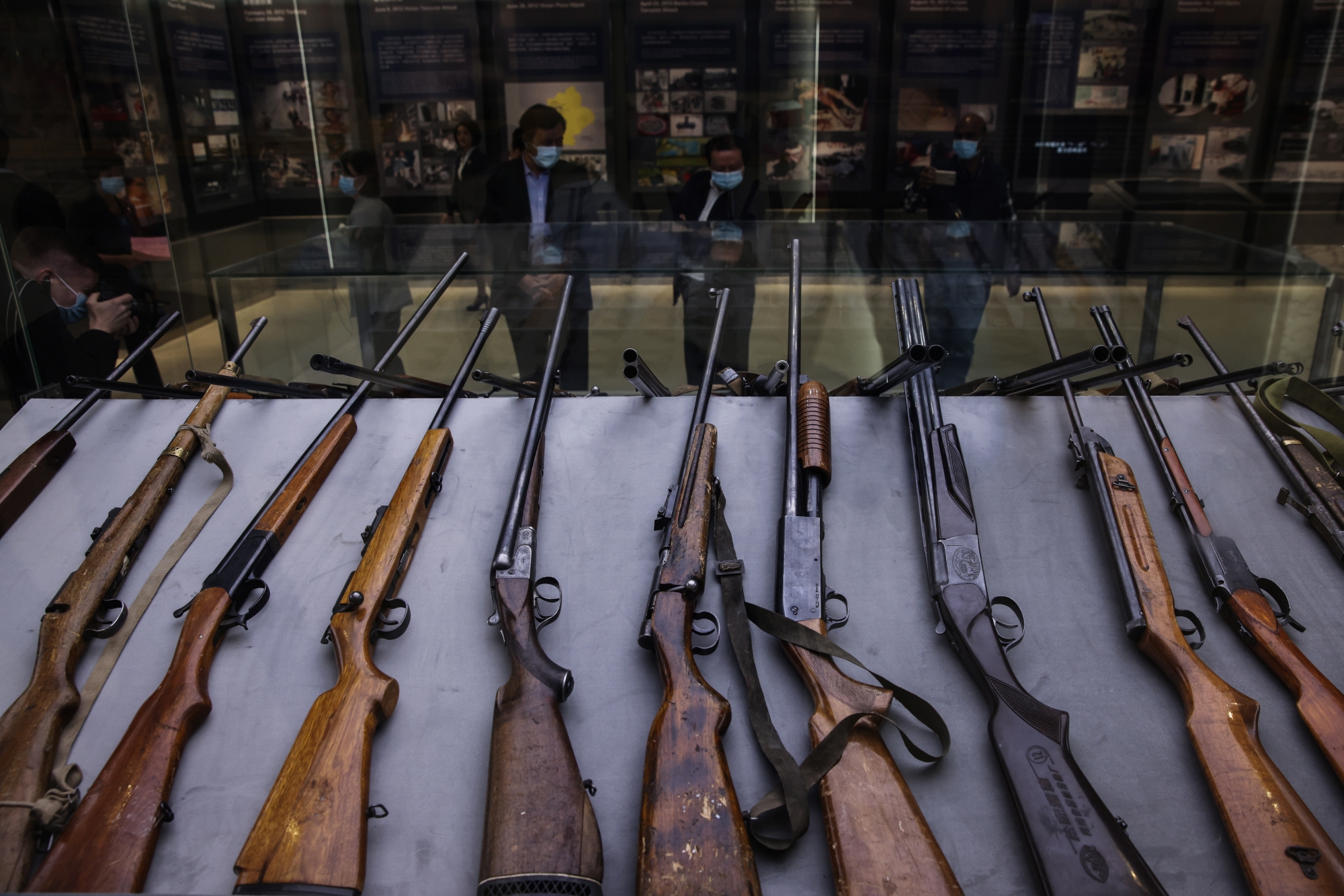 epa09169401 A display of captured guns, which were used by terrorists, at an exhibition of the fight against terrorism and extremism in Urumqi, western China's Xinjiang Uyghur Autonomous Region during a government organized trip for foreign journalists, Urumqi, China, 21 April 2021 (issued 30 April 2021). Located in the northwest of the country close to Central Asia and as the largest province-level division of China and the 8th largest country subdivision in the world, Xinjiang Uyghur Autonomous Region spans over 1.6 million square kilometres and has a population of 25.23 million inhabitants. According to the latest population census, about 46 percent of Xinjiang's population is ethnic Uighur, although not all of them are Muslim, and 40 percent is Han and the rest are Kazakh, Hui and other ethnic groups. Xinjiang suffered harsh years of terrorist attacks, mostly related to Islamist extremism, which began in 1992 and escalated between 2009 and 2014. The regional government refuses to provide data on the total victims caused by the attacks, but it is estimated that about a thousand people died and another 2,000 were injured between 1992 and 2017. The government's crackdown on extremism in the region over the years has curtailed the unrests but it has been mired in controversy in recent years with mounting criticism from the West of alleged human rights abuses. China has denied all allegations of human rights abuses, calling them the 'lie of the century'. EPA/WU HONG ATTENTION: This Image is part of a PHOTO SET