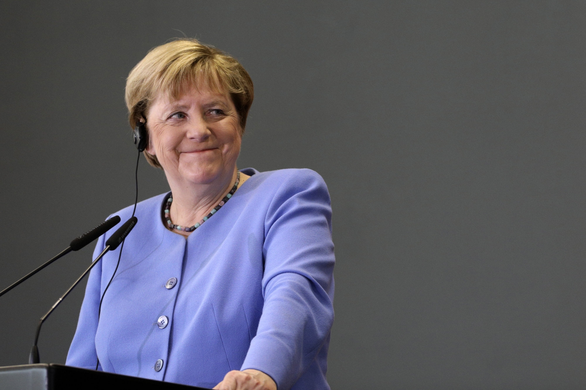 German Chancellor Angela Merkel smiles during a news conference with the Albanian Prime Minister Edi Rama in Tirana, Albania, Tuesday, Sept. 14, 2021. Merkel is on a farewell tour of the Western Balkans, as she announced in 2018 that she wouldn't seek a fifth term as Germany's Chancellor. (AP Photo/Franc Zhurda)