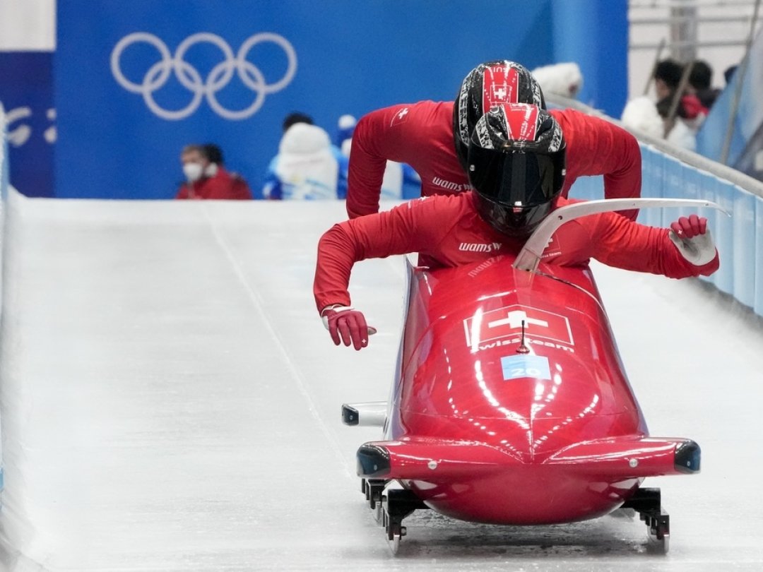 Les Suisses durant une session d'entraînement pour la compétition de bob à deux.