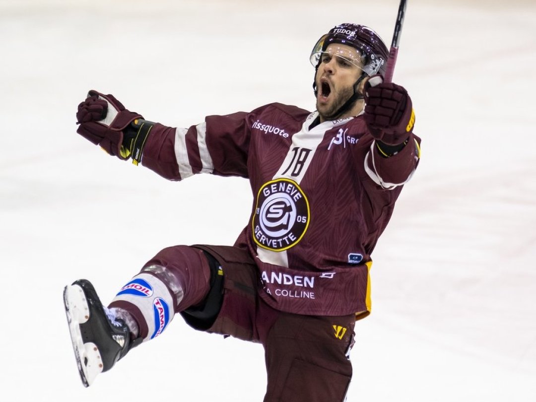 L'attaquant genevois Marc-Antoine Pouliot laisse éclater sa joie après avoir inscrit le but de la victoire à la 115e minute.