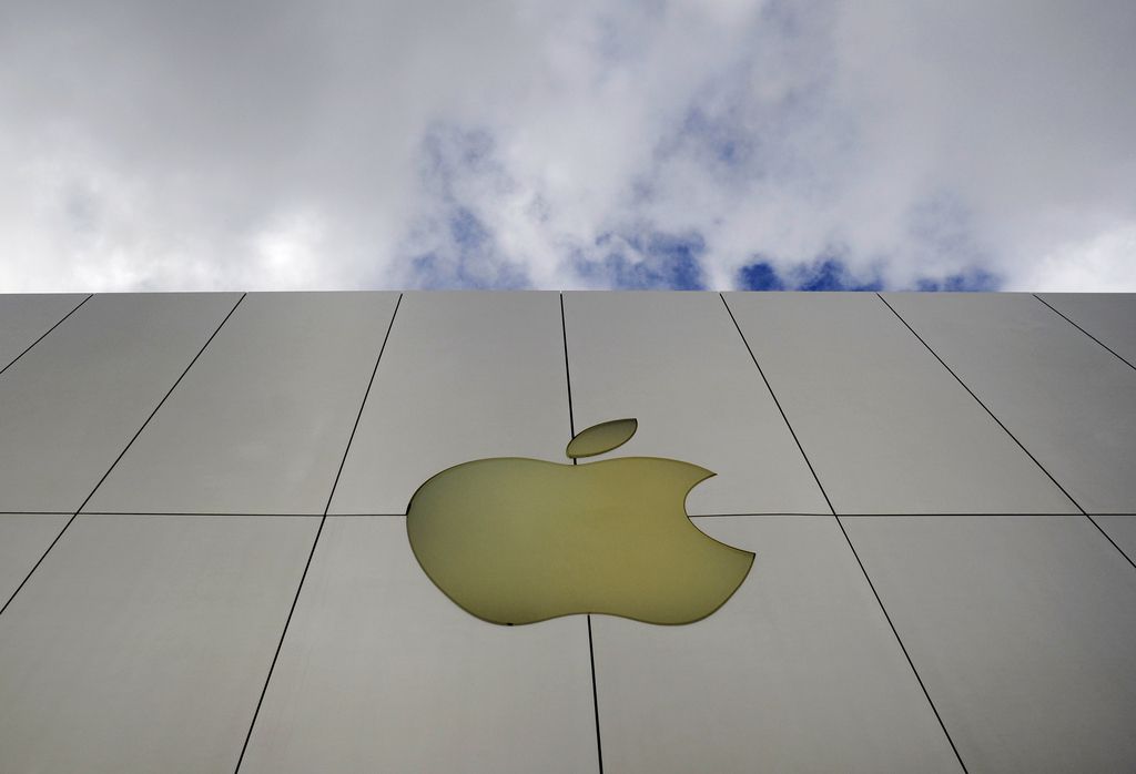 FILE - In this Oct. 19, 2009 file photo, the Apple logo is seen on an Apple store in San Francisco. Exxon has once again surpassed Apple as the world's most valuable company after the iPhone and iPad maker saw its stock price falter, according to reports Friday, Jan. 25, 2013. Apple first surpassed Exxon in the summer of 2011. The two companies traded places through that fall, until Apple surpassed Exxon for good in early 2012. (AP Photo/Russel A. Daniels, File)