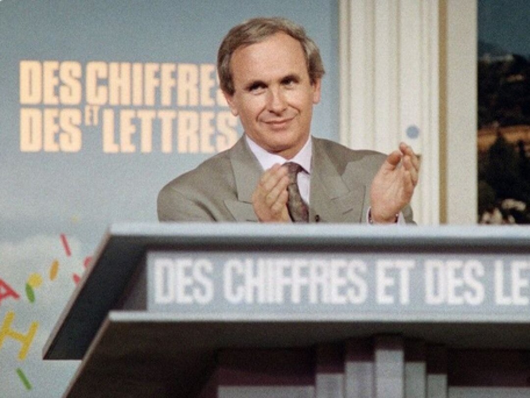 Après 50 ans, le plus ancien jeu télévisé de France, "Des chiffres et des lettres", va disparaître des grilles à la rentrée. Photo : L'animateur de l'émission Patrice Laffont dans les années 80.