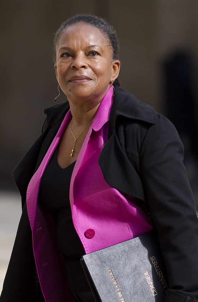 epa03276953 French Justice Minister Christiane Taubira arrives for the weekly cabinet meeting at the Elysee Palace, in Paris, France, 22 June 2012. The French government underwent a minor adjustment on 21 June, with the cabinet now totallling 38 members, four more than the previous one. The new cabinet features 19 men and 19 women, as well as the prime minister.  EPA/IAN LANGSDON