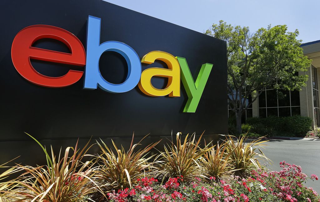 FILE - This Tuesday, July 16, 2013, file photo shows an eBay sign at eBay headquarters in San Jose, Calif. The company reports quarterly earnings on Wednesday, Oct. 16, 2013. (AP Photo/Ben Margot, File)