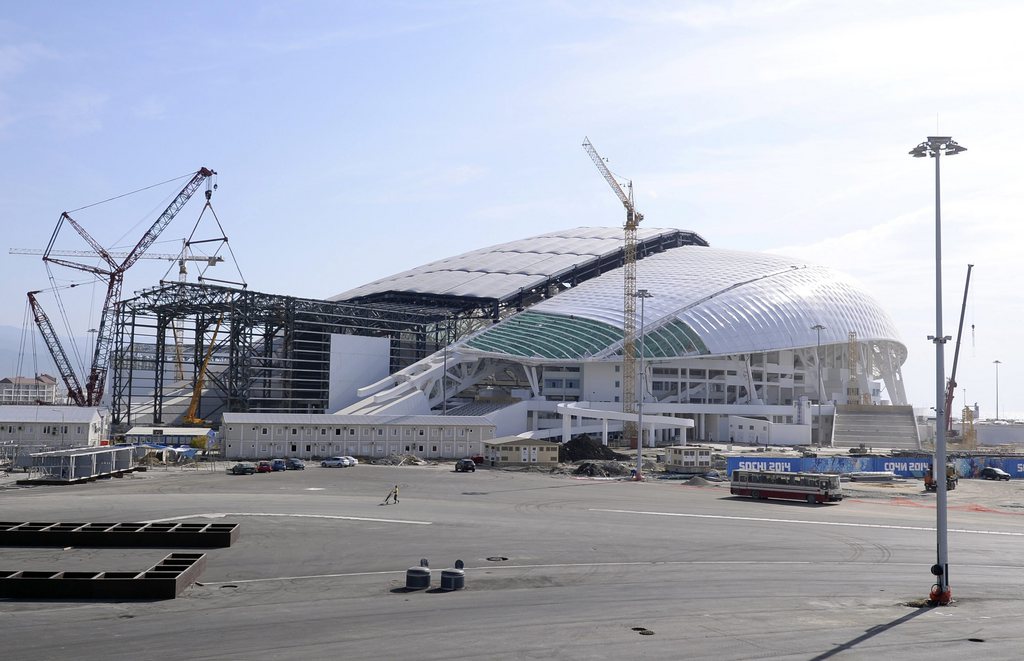 epa03914607 Construction works at the Fisht Olympic Stadium for the upcoming 22nd Winter Olympics 2014 in Sochi, Russia, 18 October 2013. Sochi will host the Winter Olympic Games from 07 to 23 February 2014.  EPA/HANS KLAUS TECHT