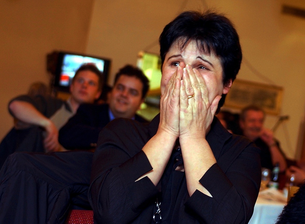 Anita Chaaban, main initiator of a people's initiative in favour of locking up violent offenders for life, reacts in Zurich, Switzerland, Sunday, February 8, 2004, after first extrapolations indicate that the Swiss have agreed to the initiative. (KEYSTONE/Walter Bieri)