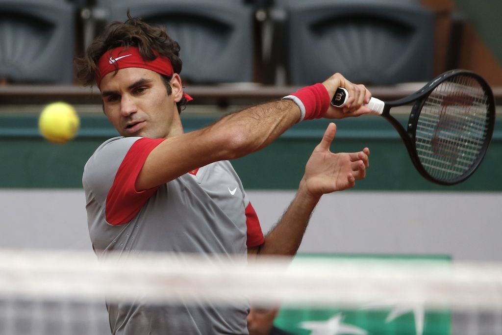 Le Suisse Roger Federer lors de la troisième manche de son match face à Dmitry Tursunov.