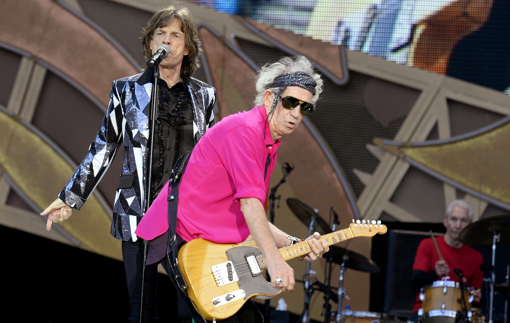 Mick Jagger, left, and Keith Richards, right, of the British rock band the Rolling Stones performs during their concert at the Letzigrund stadium in Zurich, Switzerland, Sunday, June 1, 2014. The concert is part of the bands 14 On Fire Tour. (KEYSTONE/Walter Bieri)