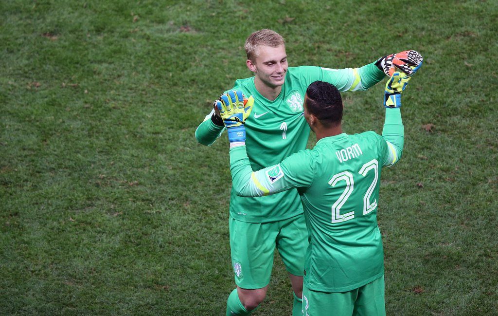 epa04312982 Goalkeeper Jasper Cillessen of the Netherlands is substituted by Michel Vorm during the FIFA World Cup 2014 third place match between Brazil and the Netherlands at the Estadio Nacional in Brasilia, Brazil, 12 July 2014. ....(RESTRICTIONS APPLY: Editorial Use Only, not used in association with any commercial entity - Images must not be used in any form of alert service or push service of any kind including via mobile alert services, downloads to mobile devices or MMS messaging - Images must appear as still images and must not emulate match action video footage - No alteration is made to, and no text or image is superimposed over, any published image which: (a) intentionally obscures or removes a sponsor identification image; or (b) adds or overlays the commercial identification of any third party which is not officially associated with the FIFA World Cup)  EPA/FERNANDO BIZERRA JR   EDITORIAL USE ONLY