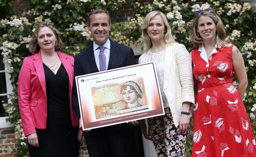 epa03799726 (L-R) Mary Macleod, a Conservative member of parliament, Mark Carney, governor of the Bank of England, Stella Creasy, a Labour and Co-operative member of parliament, and Caroline Criado-Perez, co-founder of the Women's Room, pose for a photograph following the presentation of the concept design for the new Bank of England ten pound banknote, featuring author Jane Austen at the Jane Austen House Museum in Chawton, near Alton, U.K., 24 July 2013. Jane Austen will appear on the U.K.'s next 10-pound note, ensuring at least one female figure is represented on the currency in circulation.  EPA/BLOOMBERG / POOL