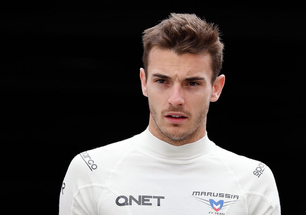 epa04432489 (FILE) File picture dated 22 May 2014 of French Formula One driver Jules Bianchi of Marussia F1 Team walks in paddock during the first practice session at the Monte Carlo circuit in Monaco. ules Bianchi of Marussia has been taken to hospital with undisclosed injuries in a crash at the Japanese Grand Prix on 05 October 2014, Ferrari tweet. "Jules Bianchi has been taken to the hospital by ambulance," Ferrari tweeted. The cause of the accident was not clear but it appears that Bianchi's car crashed into a crane which was to lift the crashed car of Adrian Sutil off the track.  EPA/VALDRIN XHEMAJ *** Local Caption *** 51380235