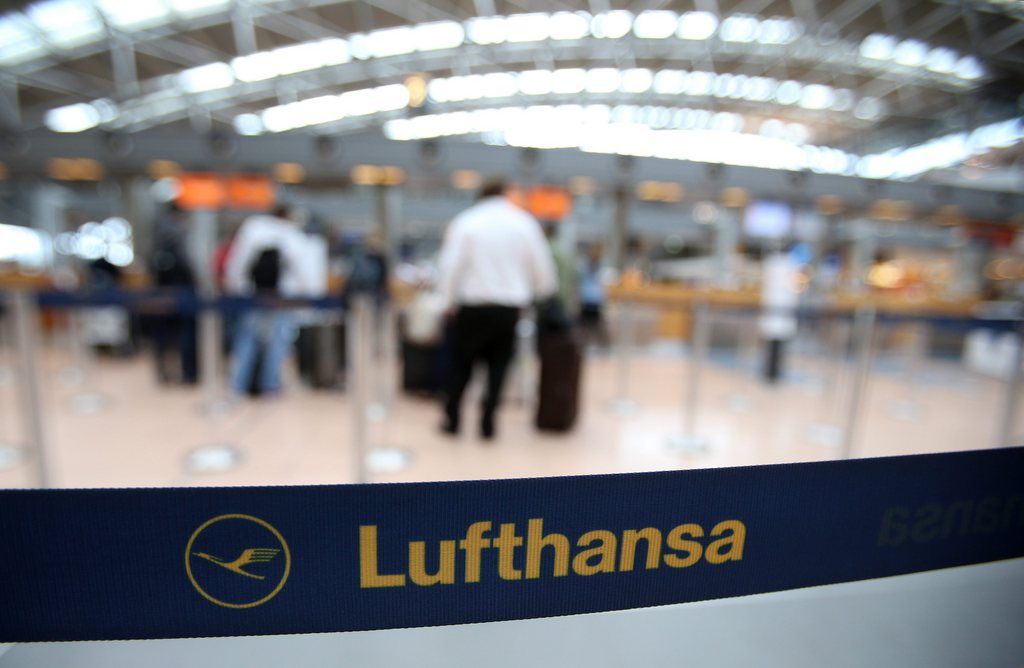 epa04393618 Passengers stand at the check-in counters of Lufthansa at Hamburg airport, in Hamburg, Germany, 10 September 2014. Because of a strike of Lufthansa pilots at Munich airport, 15 flights from and to Munich were cancelled at Hamburg airport. Lufthansa pilots are on strike for the third time in two weeks, this time at Munich airport and threatening the cancellation of about 160 flights, in an effort to step up their industrial action against the German airline's planned new early retirement scheme.  EPA/CHRISTIAN CHARISIUS