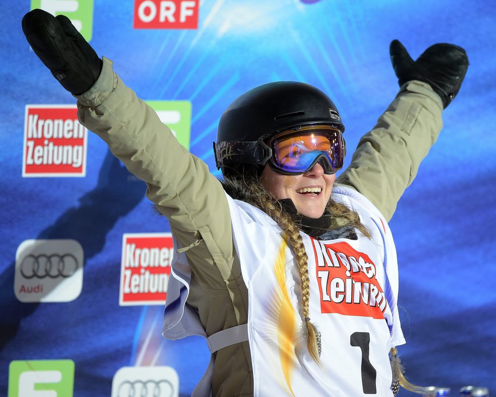 epa04582146 Fifth placed Lia-Mara Boesch of Switzerland celebrates on the podium after the women's Big Air Finals at the FIS Snowboard World Championships 2015 Kreischberg, Austria, 24 January 2015.  EPA/BARBARA GINDL