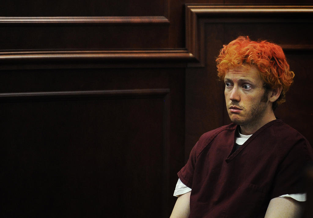 FILE - In this Monday, July 23, 2012 file photo, James Holmes appears in Arapahoe County District Court in Centennial, Colo. In July 2015, a jury convicted Holmes of 12 murders at a movie theater in Aurora, Colo., after a trial that delved deeply into his mental problems. (RJ Sangosti/The Denver Post via AP, Pool)