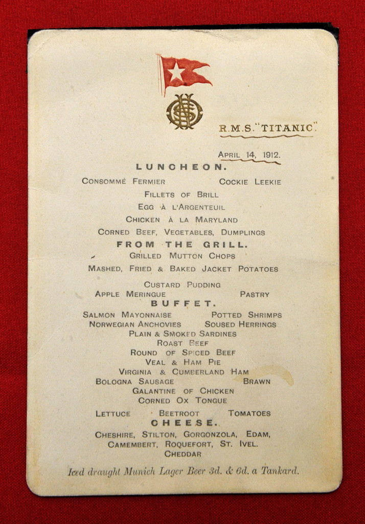 This Wednesday March 28, 2012 shows a menu given to first class passengers on the day of the sinking of the Titanic as part of an auction of Titanic memorabilia at Henry Aldridge and Son in Devizes, England to commemorate the centenary of the ships completion. The menu, kept by a prominent San Francisco banker, bears the date April 14, the day in 1912 that the reputedly unsinkable cruiser hit an iceberg and fell to the bottom of the Atlantic.    (AP Photo/Tim Ireland/PA Wire)  UNITED KINGDOM OUT NO SALES NO ARCHIVE