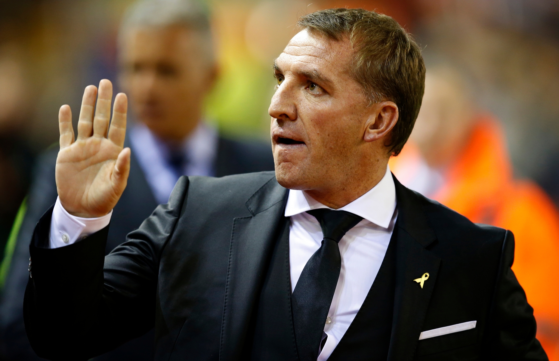Liverpool manager Brendan Rodgers acknowledges the fans during the Capital One Cup, third round match at Anfield, Liverpool. (KEYSTONE/PRESS ASSOCIATION IMAGES/Peter Byrne)3 24221780