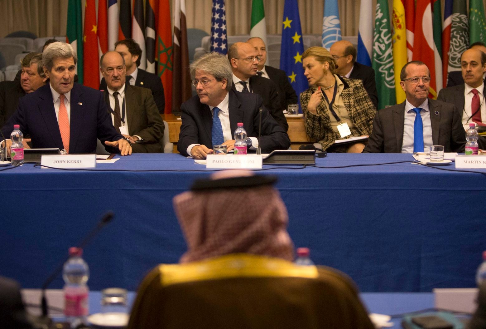 From left, US Secretary of State John Kerry, Italian Foreign Minister Paolo Gentiloni and Special Representative of the UN Secretary-General for Libya Martin Kobler wait for the start of a conference on Libya at the Italian Foreign Ministry headquarters in Rome, Sunday, Dec. 13, 2015.  Foreign ministers were poised to endorse a U.N.-brokered national unity plan for Libya at a Rome conference aimed at prodding the North Africa country's bickering factions to fulfill their commitment to sign the agreement and abide by its terms. (AP Photo/Riccardo De Luca) Italy EU Libya