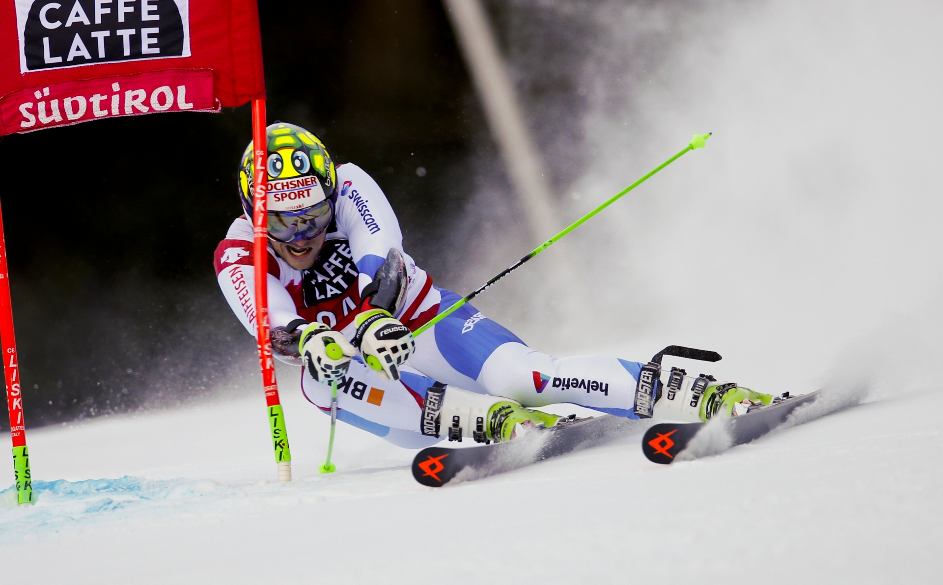 Switzerland's Justin Murisier speeds down the course during the first run of an alpine ski, men's World Cup giant slalom, in Alta Badia, Italy, Sunday, Dec. 20, 2015. (AP Photo/Marco Trovati) Italy Alpine Skiing World Cup
