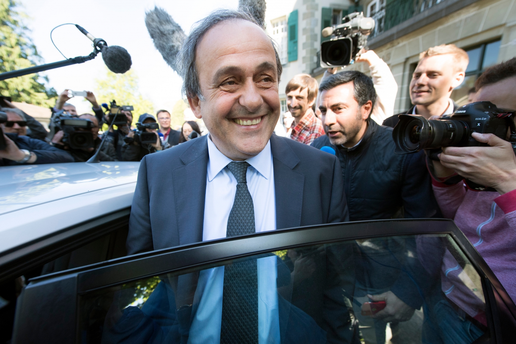 UEFA President Michel Platini of France leaves the international Court of Arbitration for Sport, CAS, surrounded by the media after a hearing in Lausanne, Switzerland, Friday, April 29, 2016. European football chief Michel Platini appealed against a six-year FIFA ban from all football-related activity. Platini, the UEFA president, was suspended by FIFA's ethics committee for receiving a two million Swiss francs ($2 million) payment in 2011 from Blatter, who was then the FIFA president. (KEYSTONE/Laurent Gillieron) SWITZERLAND CAS SOCCER PLATINI