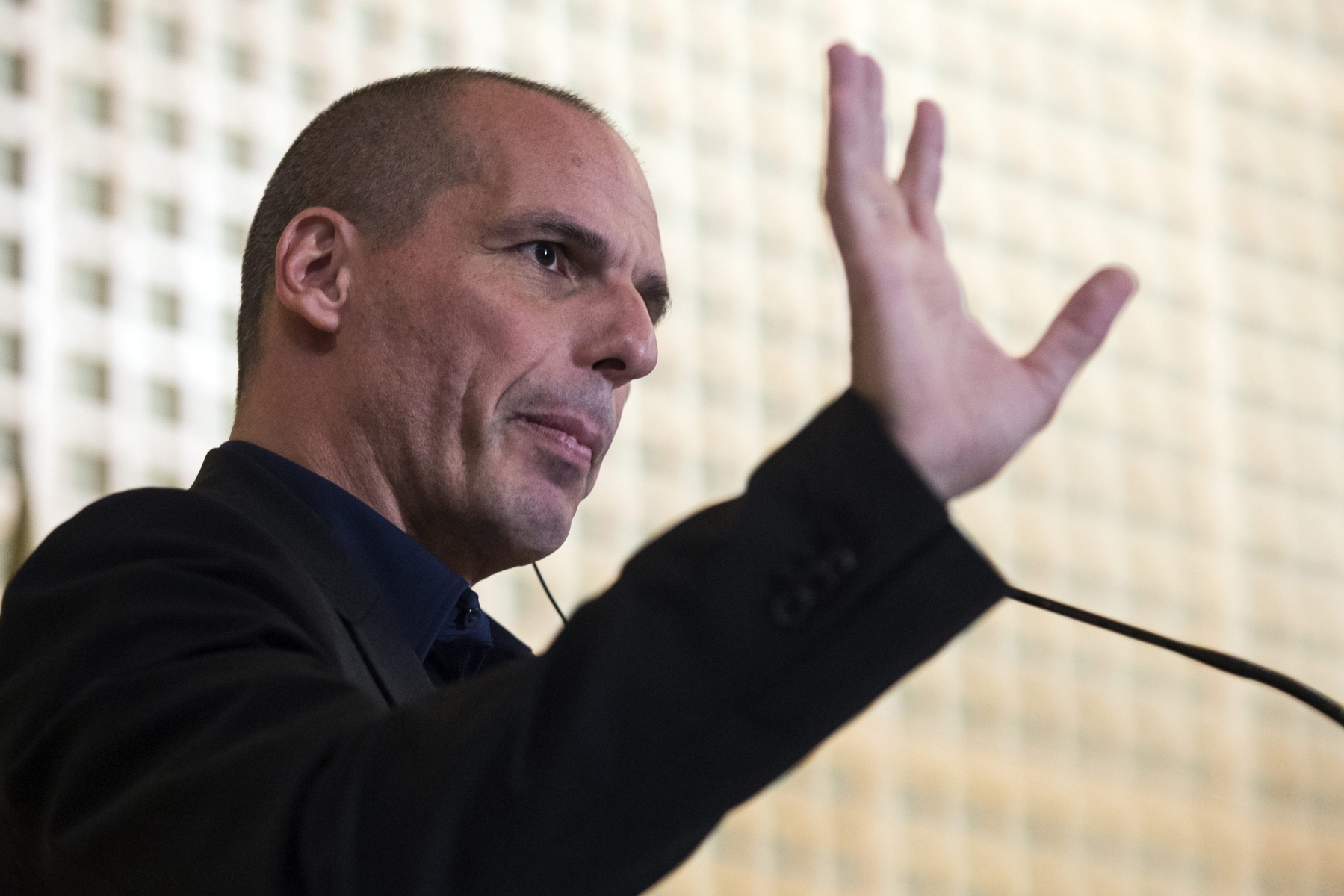 epa04599856 Greek newly appointed Finance Minister Yanis Varoufakis delivers a speech with his French counterpart Michel Sapin (not pictured) during a press conference after a meeting at the French Ministry of Economy and Finance of Becy in Paris, France, 01 February 2015. Greece's finance minister kicked off a European roadshow in Paris as the country's newly elected prime minister showed willingness to negotiate on Greek debt repayment. Appointed on the 27 January 2015 following the victory of the Greek far left party Syriza and its leader Tsipras, Varoufakis got a head start on his own tour as he met with before heading on to London on 01 February and Rome on 02 February.  EPA/ETIENNE LAURENT FRANCE GREECE DIPLOMACY