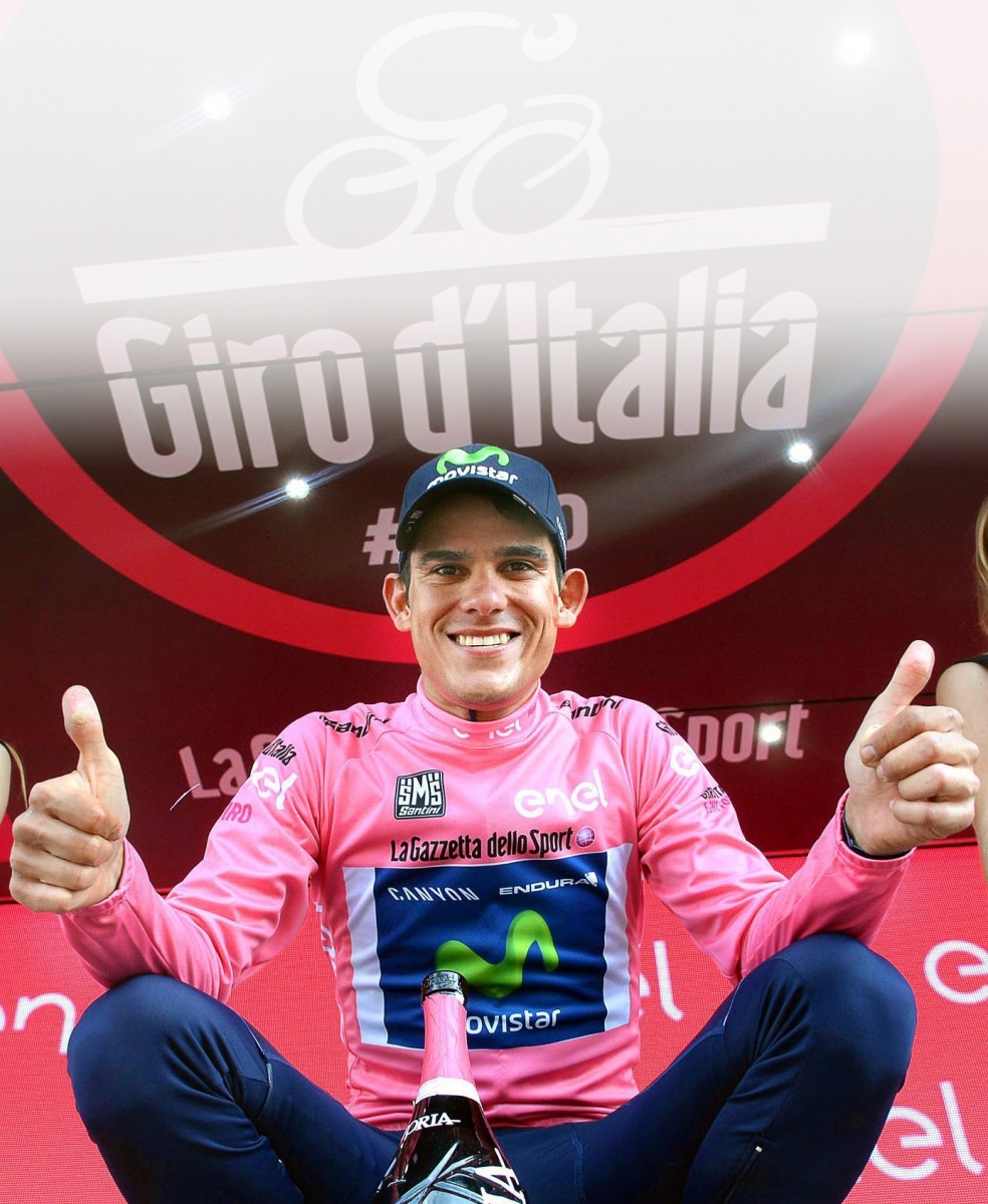 epa05319676 Costa Rican rider Andrey Amador of the Movistar Team celebrates on the podium wearing the overall leader's pink jersey after the 13th stage of the Giro d'Italia cycling race over 170km from Palmanova to Cividale del Friuli, Italy, 20 May 2016.  EPA/LUCA ZENNARO ITALY CYCLING GIRO D'ITALIA