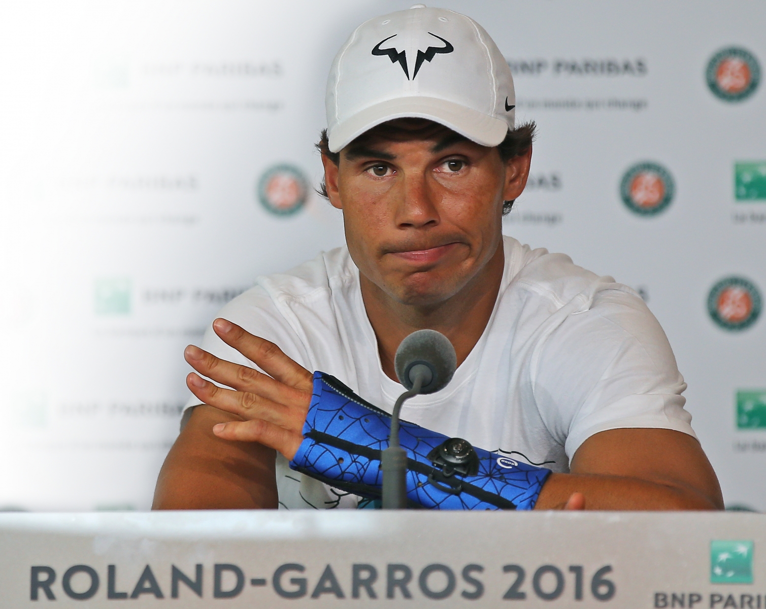 Nine-time champion Rafael Nadal announces he is pulling out of the French Open because of an injury to his left wrist during a press conference at the Roland Garros stadium in Paris, France, Friday May 27, 2016. The left-handed Nadal made the announcement at a hastily arranged news conference Friday, one day before he would have been scheduled to play his third-round match. (AP Photo/Michel Euler) APTOPIX France Tennis French Open Nadal