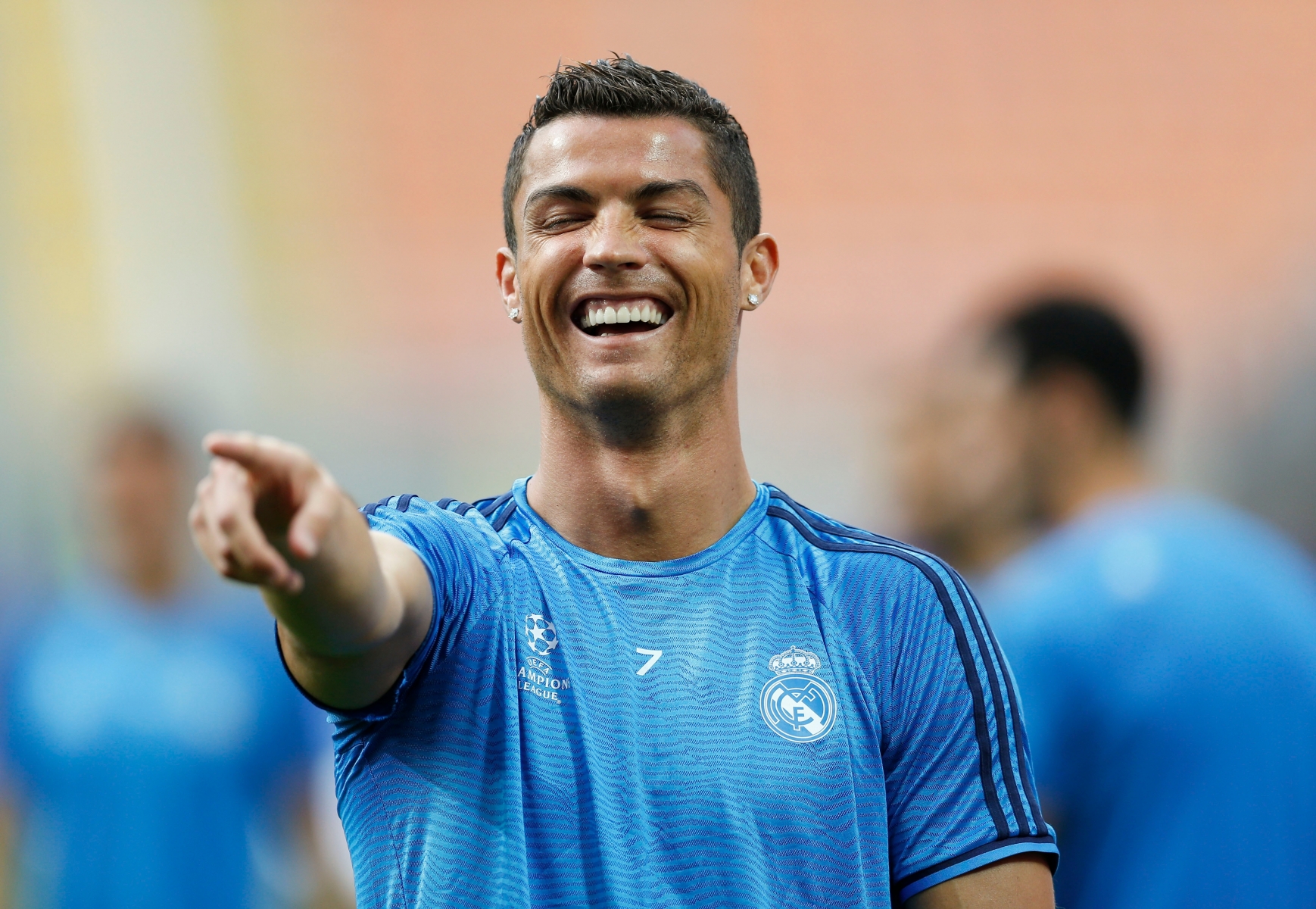 Real Madrid's Cristiano Ronaldo smiles during a training session at the San Siro stadium in Milan, Italy, Friday, May 27, 2016. The Champions League final soccer match between Real Madrid and Atletico Madrid will be held at the San Siro stadium on Saturday, May 28. (AP Photo/Manu Fernandez) Italy Soccer Champions League Final