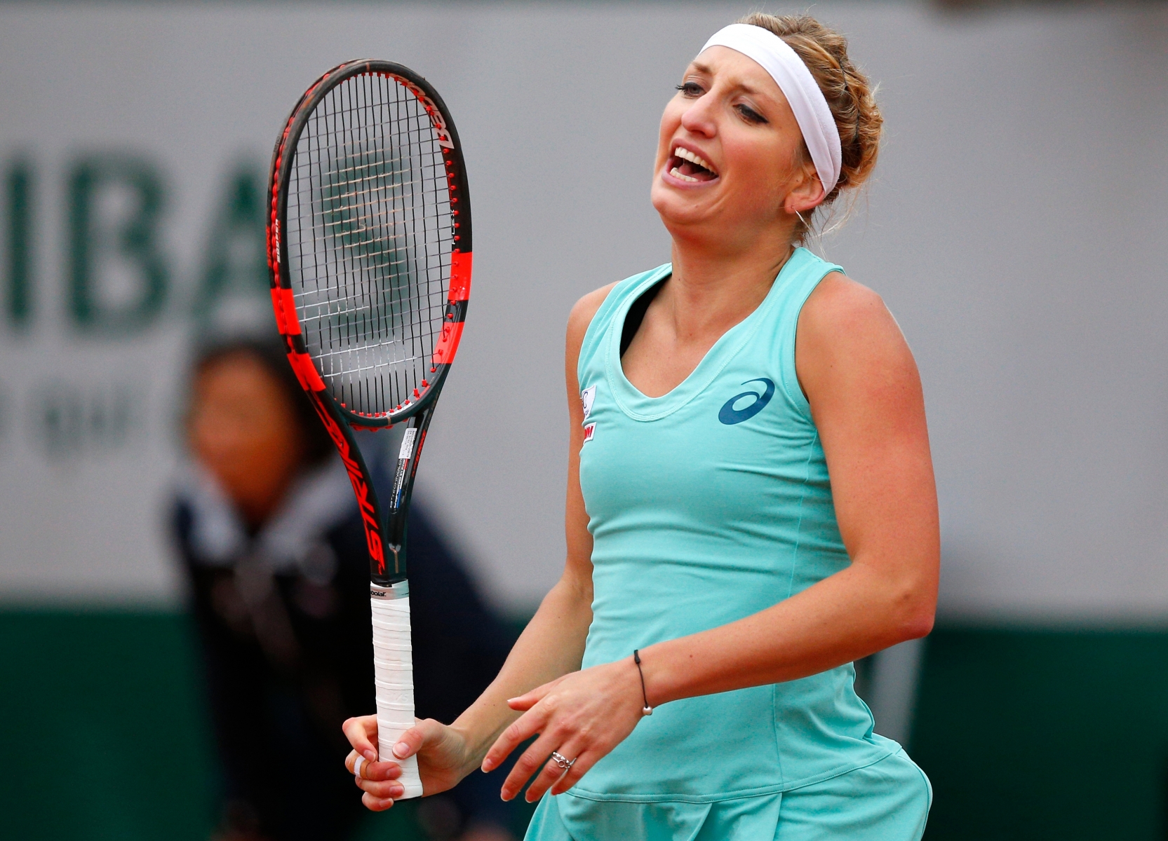 Timea Bacsinszky of Switzerland reacts as she plays Netherlands' Kiki Bertens during their quarterfinal match of the French Open tennis tournament at the Roland Garros stadium, Thursday, June 2, 2016 in Paris.  (AP Photo/Christophe Ena) France Tennis French Open