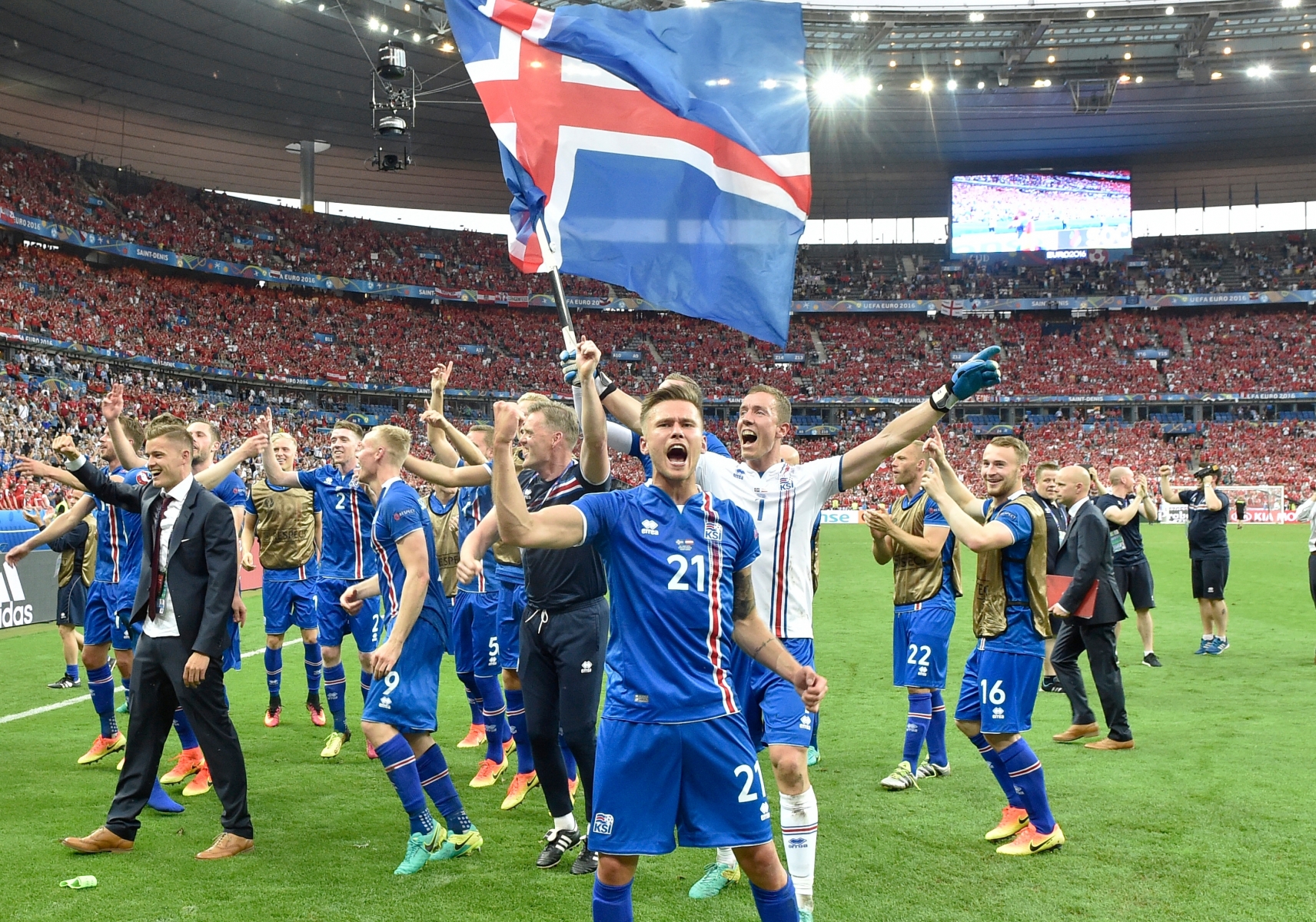 Iceland goalkeeper Hannes Halldorsson, center right, and Arnor Ingvi Traustason, center, celebrate with team mates after the Euro 2016 Group F soccer match between Iceland and Austria at the Stade de France in Saint-Denis, north of Paris, France, Wednesday, June 22, 2016. (AP Photo/Martin Meissner) APTOPIX Soccer Euro 2016 Iceland Austria