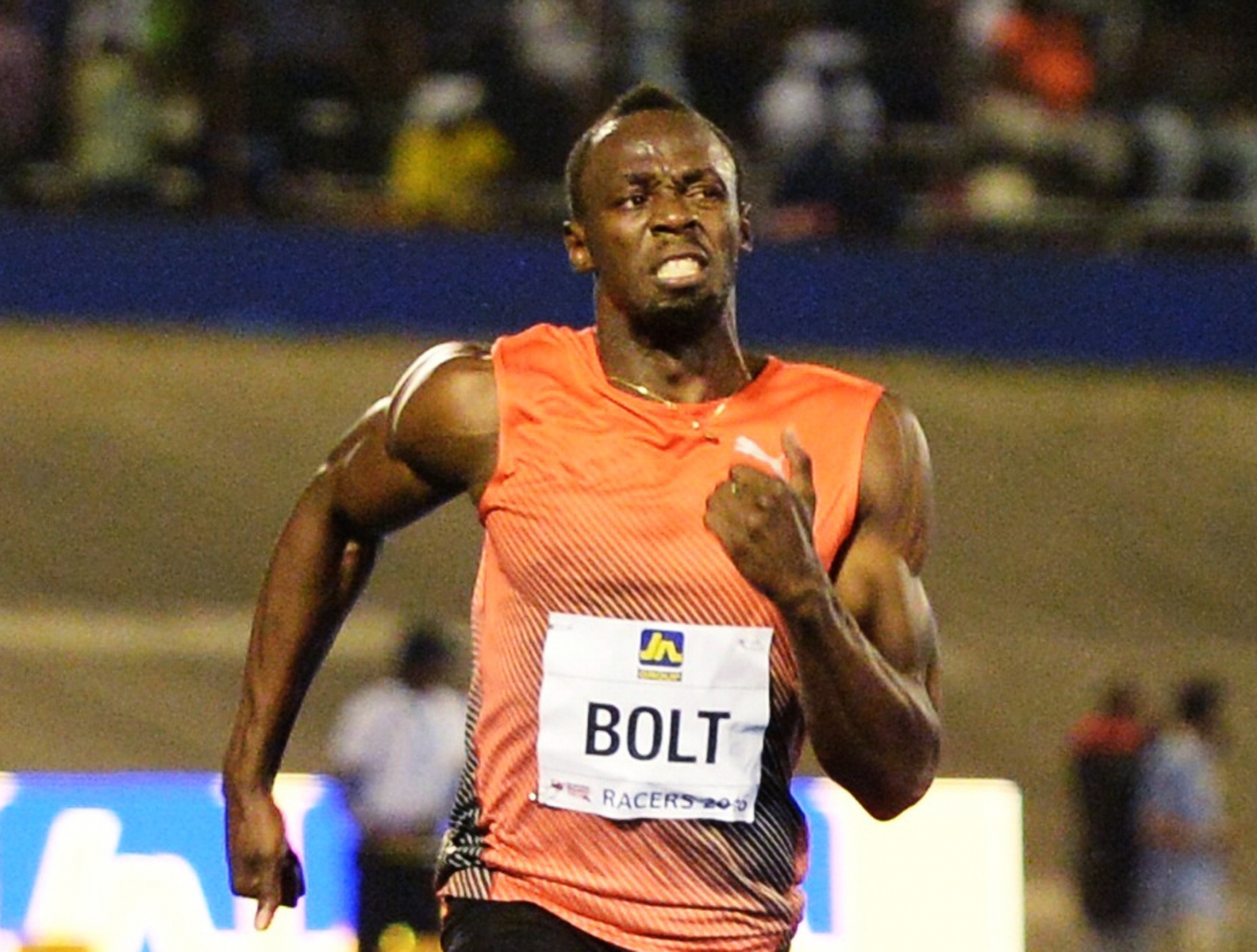 Usain Bolt, of Jamaica, wins the 100-meter final ahead of Yohan Blake and Asafa Powell, both of Jamaica, in the Racers Grand Prix track and field event at the National Stadium in Kingston, Jamaica, Saturday, June 11, 2016. (AP Photo/Collin Reid)bolt RACERS GRAND PRIX TRACK AND FIELD