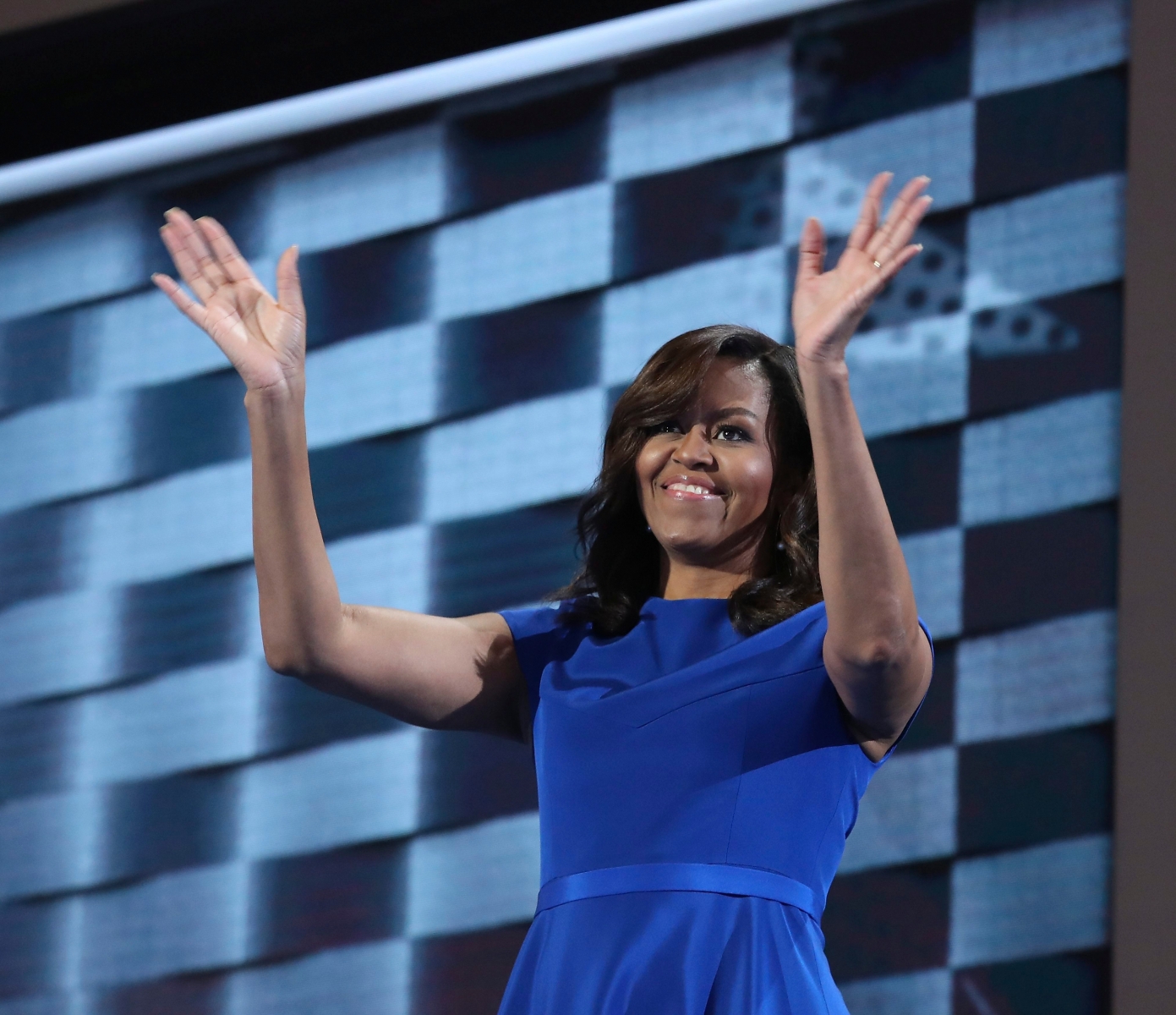 epa05441111 First Lady of the United States, Michelle Obama speaks on the first day of the Democratic National Convention at the Wells Fargo Center in Philadelphia, Pennsylvania, USA, 25 July 2016. The four-day convention is expected to end with Hillary Clinton formally accepting the nomination of the Democratic Party as their presidential candidate in the 2016 election.  EPA/ANDREW GOMBERT USA DEMOCRATIC NATIONAL CONVENTION