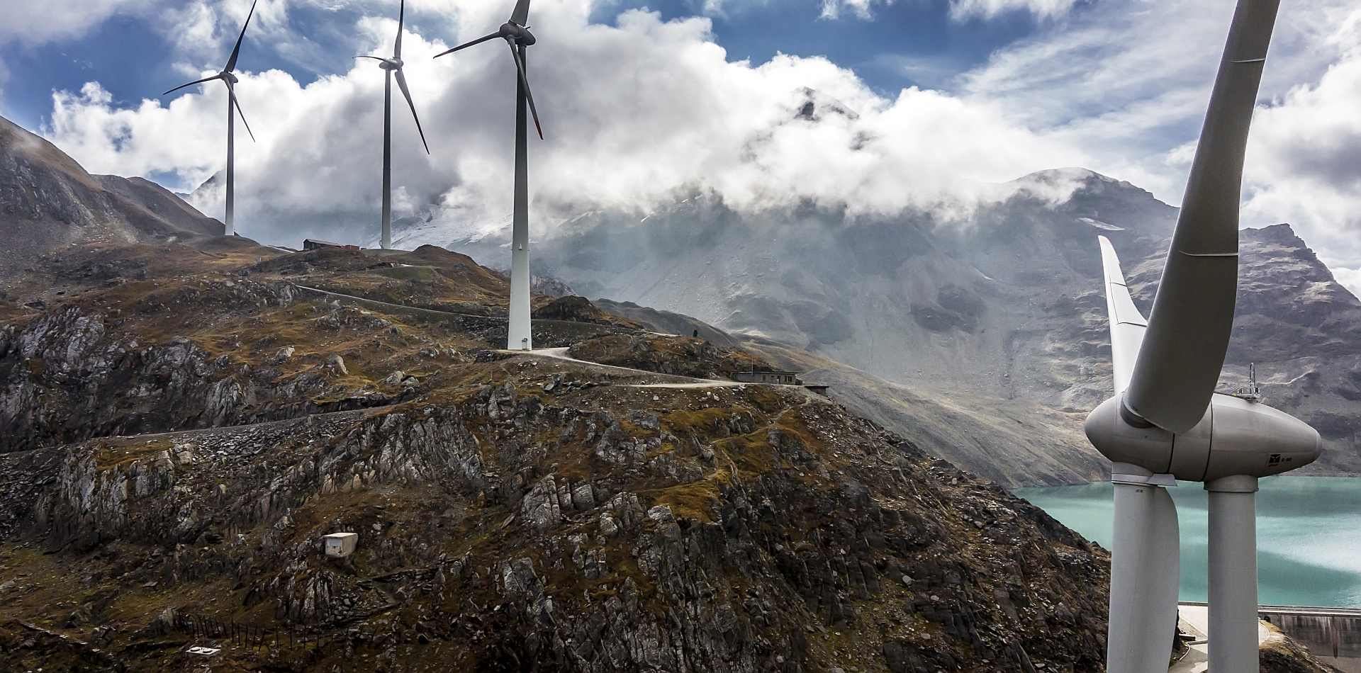 Wind turbines at the site of the highest wind park in Europe are pictured at the Griessee, near the Nufenenpass in the Swiss south Alpes, Valais, Switzerland, on September 23, 2016. The four wind turbines of this wind park were developed by the company SwissWinds GmbH and are inaugurated this Friday, September 30 2016. (KEYSTONE/Olivier Maire) SCHWEIZ NUFENENPASS WINDPARK