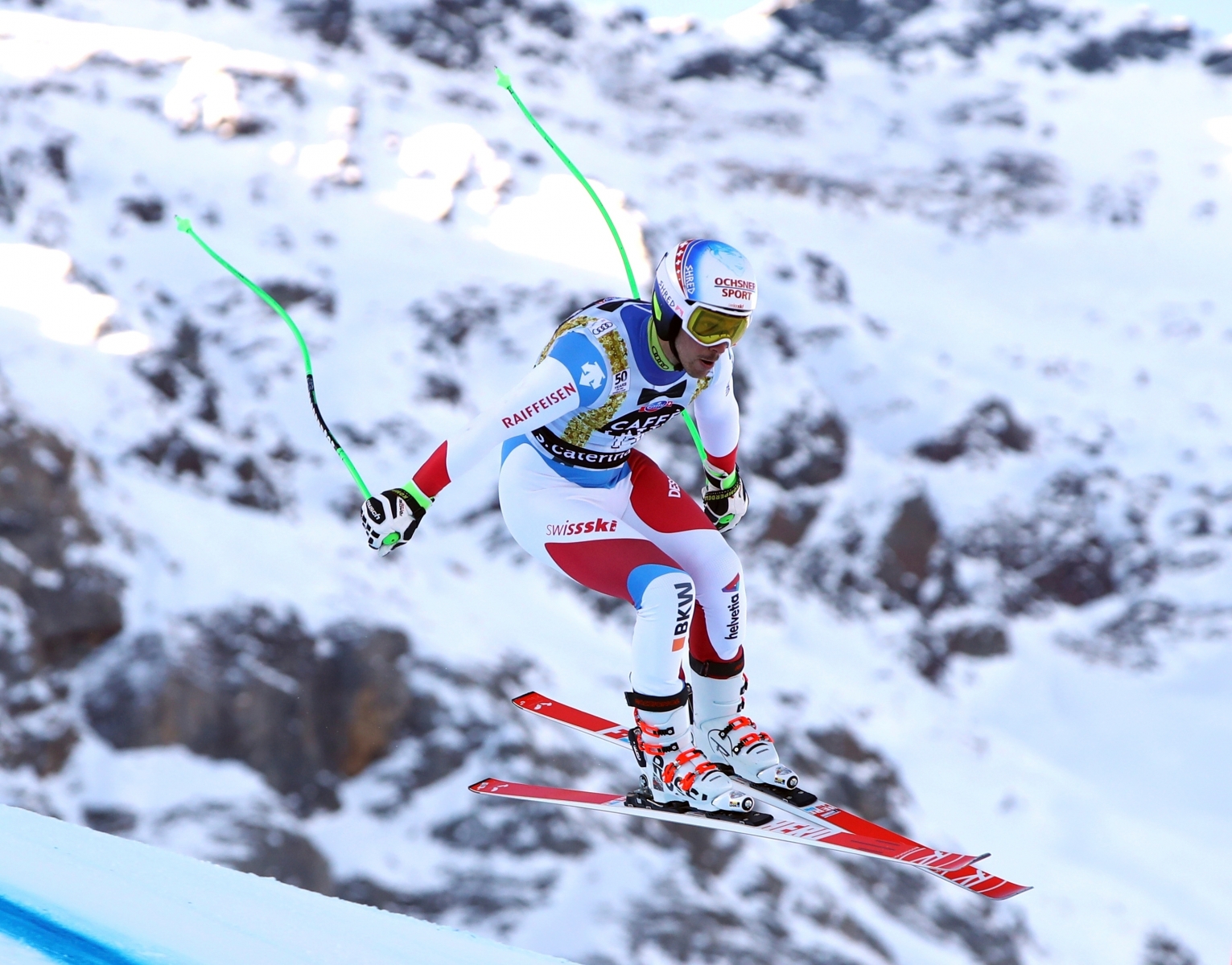 Switzerland's Carlo Janka is airborne during an alpine ski, mens' World Cup downhill training in Santa Caterina, Italy, Monday, Dec. 26, 2016. (AP Photo/Alessandro Trovati) Italy Alpine Skiing World Cup