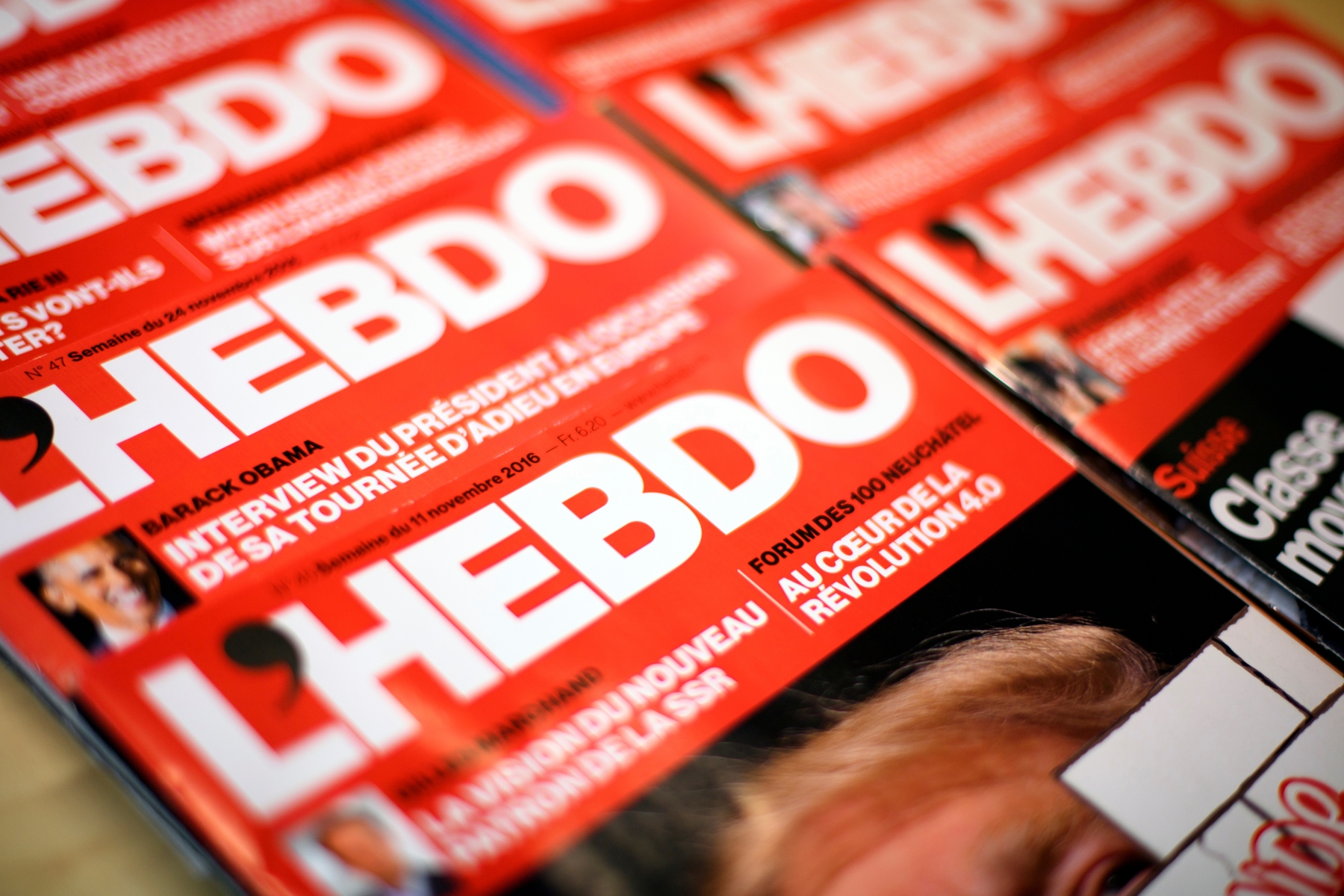 Des exemplaires du magazine hebdomadaire L'Hebdo photographies ce lundi 23 janvier 2017 a Lausanne. L'editeur Ringier Axel Springer annonce aujourd'hui l'arret de la publication de l'hebdomadaire romand L'Hebdo. (KEYSTONE/Laurent Gillieron)



Exemplare des Magazin L'Hebdo am Montag, 23. Januar 2017. Das Westschweizer Wochenmagazin L'Hebdo wird eingestellt. Der Medienkonzern Ringier teilte am 23. Januar 2017 mit, dass das Magazin am 02. Februar zum letzten Mal erscheinen wird. (KEYSTONE/Laurent Gillieron) SUISSE PRESSE L'HEBDO