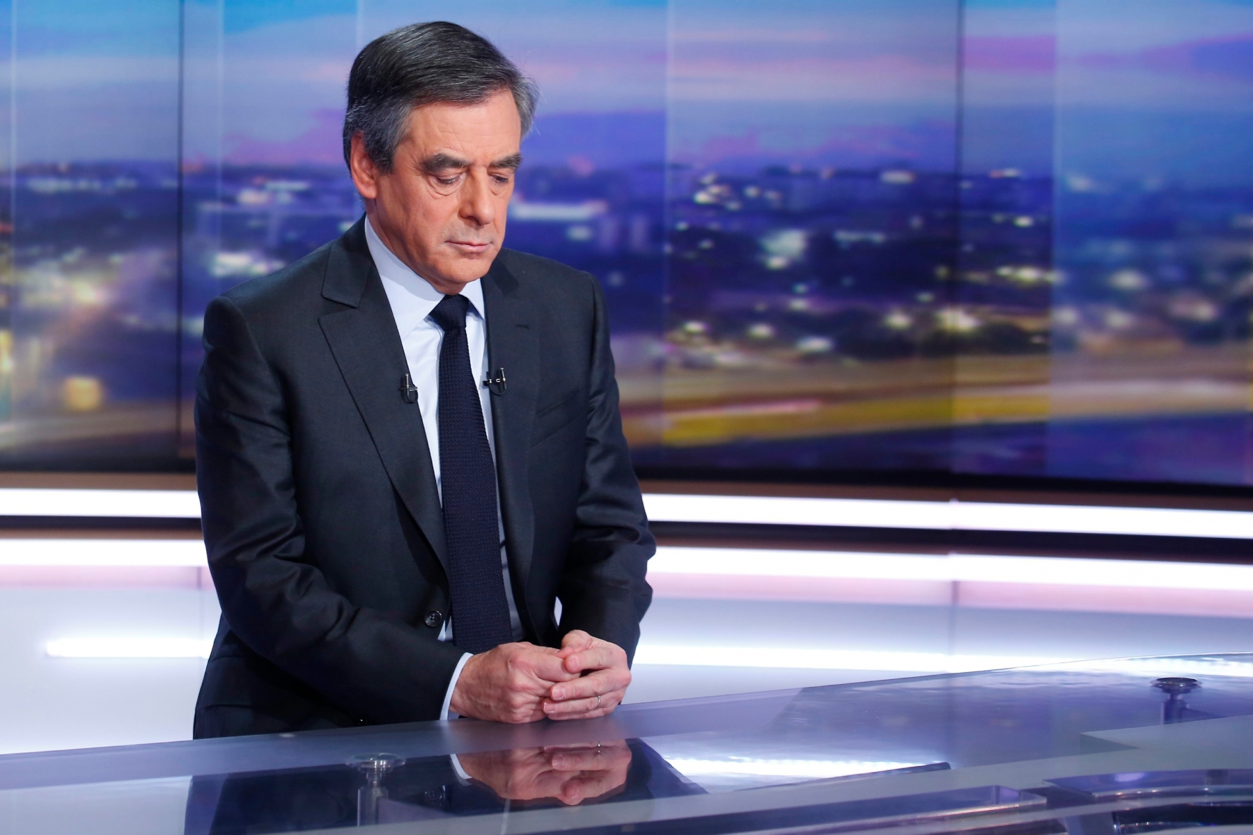 epa05752988 Former French Prime minister and right-wing candidate for the upcoming presidential election Francois Fillon poses prior to a broadcast interview on a set of French TV channel TF1, in Boulogne-Billancourt, near Paris, France, 26 January 2017. Francois Fillon has become under pressure to explain the previous employment of his wife as parliamentary aide while he was a MP and to give details of the work she did.  EPA/PIERRE CONSTANT / POOL MAXPPP OUT FRANCE ELECTIONS RIGHT WING VOTE