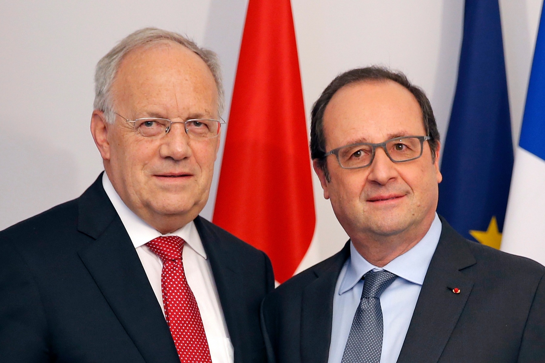 French President Francois Hollande, right, poses with Swiss President Johann Schneider-Ammann during a bilateral meeting at the official opening ceremonies of the Unterlinden museum in Colmar, Eastern France, Saturday Jan. 23, 2016. (Vincent Kessler, Pool Photo via AP)   France Switzerland