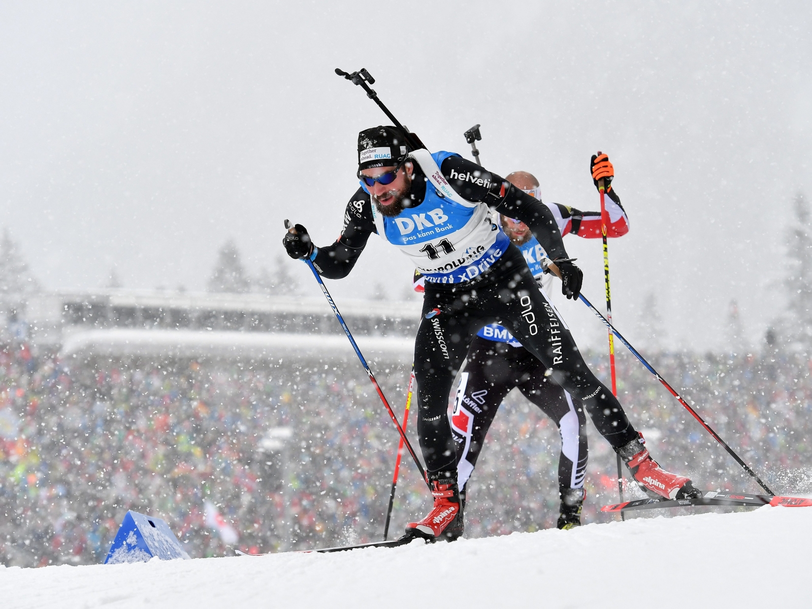 epa05718558 Switzerland's Benjamin Weger in action during the Men's 12,5 km Pursuit Competition at the Biathlon World Cup in Ruhpolding, Germany, 15 January 2017.  EPA/KERSTIN JOENSSONBenjamin Weger BIATHLON WELTCUP 2016/17 OBERHOF