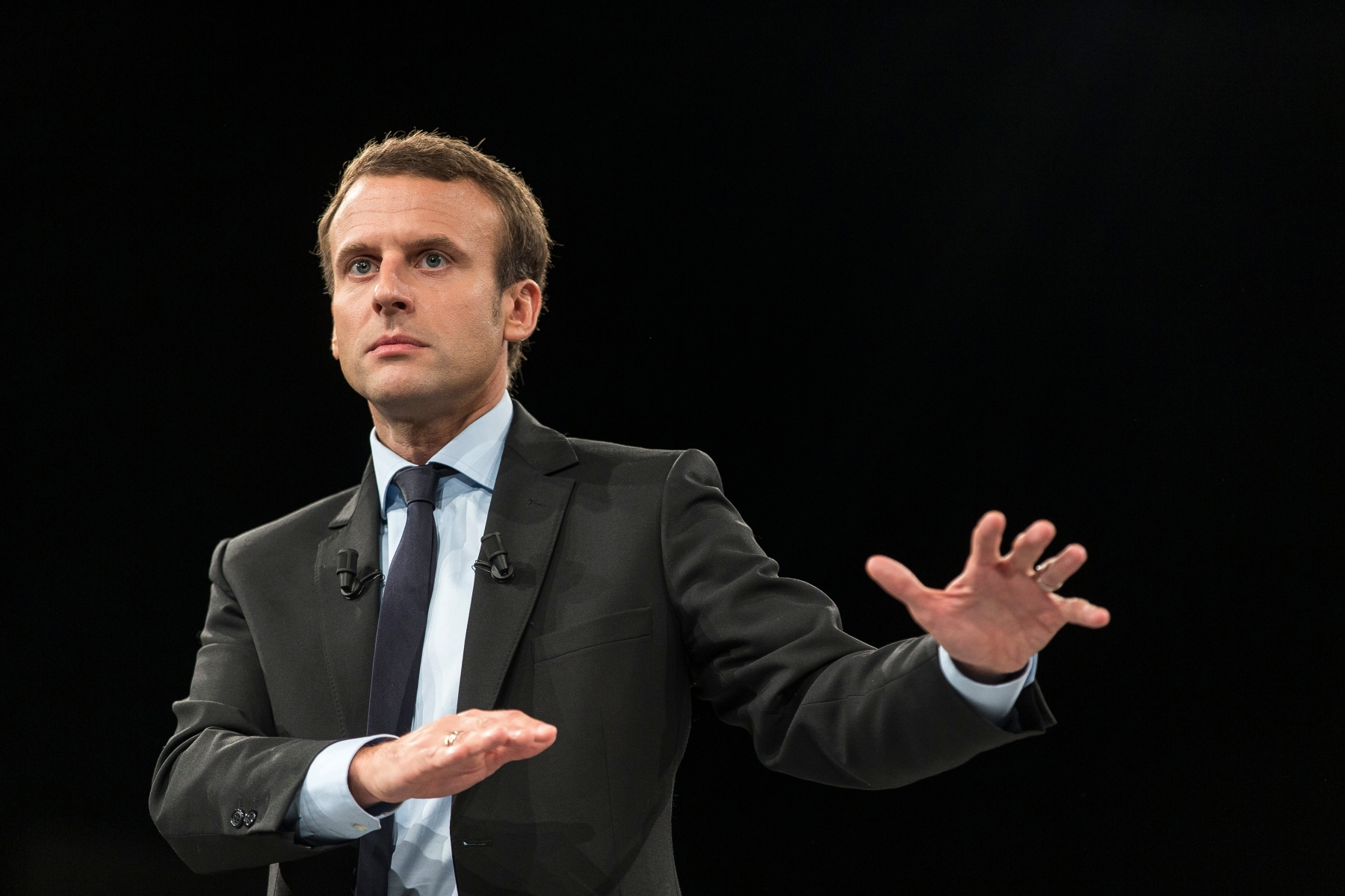 In this photo dated Tuesday, Oct. 4, 2016 former French Economy Minister and potential French presidential contender Emmanuel Macron gestures as he delivers his speech during a political rally in Strasbourg, eastern France. Macron is the founder of a political movement called "En Marche" (On the Move). (AP Photo/Jean-Francois Badias) France Presidential Race