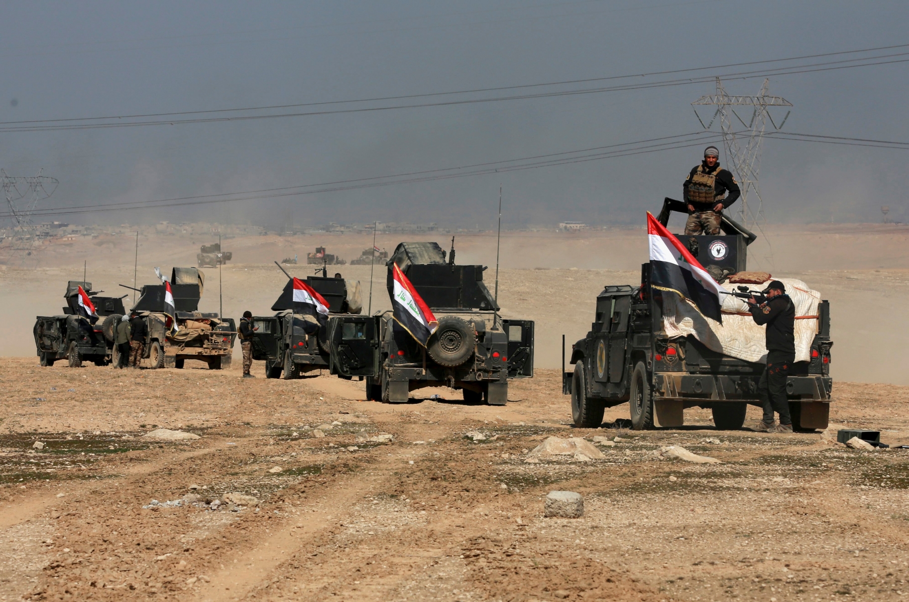 Iraqi special forces advance towards the western side of Mosul, Iraq, Thursday, Feb. 23, 2017. The advance comes as part of a major assault that started five days earlier to drive Islamic State militants from the western half of Mosul, Iraq's second-largest city. (AP Photo/ Khalid Mohammed) Iraq Mosul