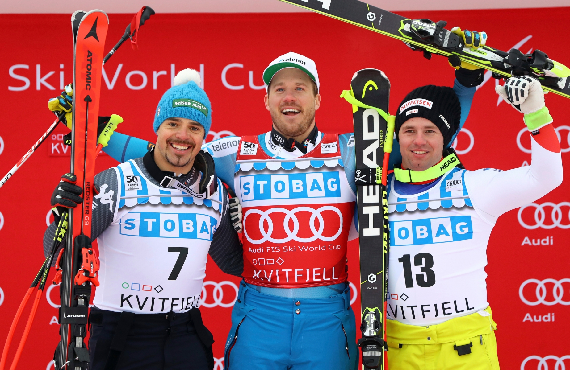From left, second placed Italy's Peter Fill, winner Norway's Kjetil Jansrud and third placed Switzerland's Beat Feuz celebrate on the podium of an alpine ski, men's World Cup downhill, in Kvitfjell, Norway, Saturday, Feb. 25, 2017. (AP Photo/Alessandro Trovati) Norway Alpine Skiing World Cup