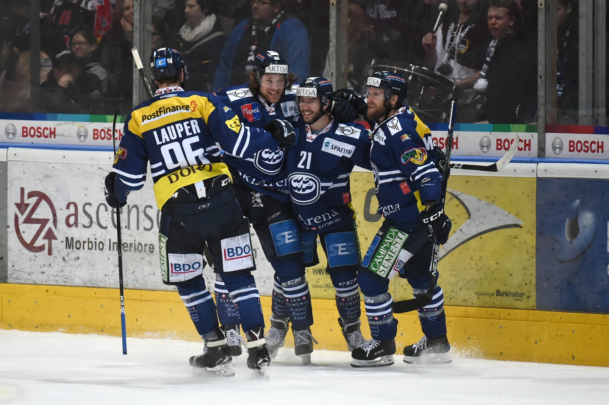 From left, Ambri's player Adrien Lauper, Ambri's player Franco Collenberg, Ambri's player Jason Fuchs and Ambri's player Mikko Maeenpaeae, celebrate 1-1, during the fourth Playout final game of National League A (NLA) Swiss Championship 2016/17 between HC Ambri Piotta and Fribourg Gotteron, at the ice stadium Valascia in Ambri, Switzerland, Tuesday, March 28, 2017. (KEYSTONE/Ti-Press/Pablo Gianinazzi) SCHWEIZ EISHOCKEY PLAYOUT-FINAL AMBRI FRIBOURG