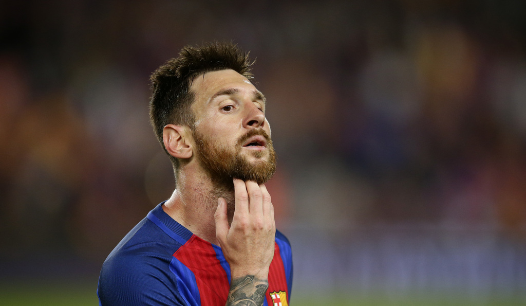 FC Barcelona's Lionel Messi gestures at the end of the Spanish La Liga soccer match between FC Barcelona and Eibar at the Camp Nou stadium in Barcelona, Spain, Sunday, May 21, 2017. (AP Photo/Manu Fernandez)