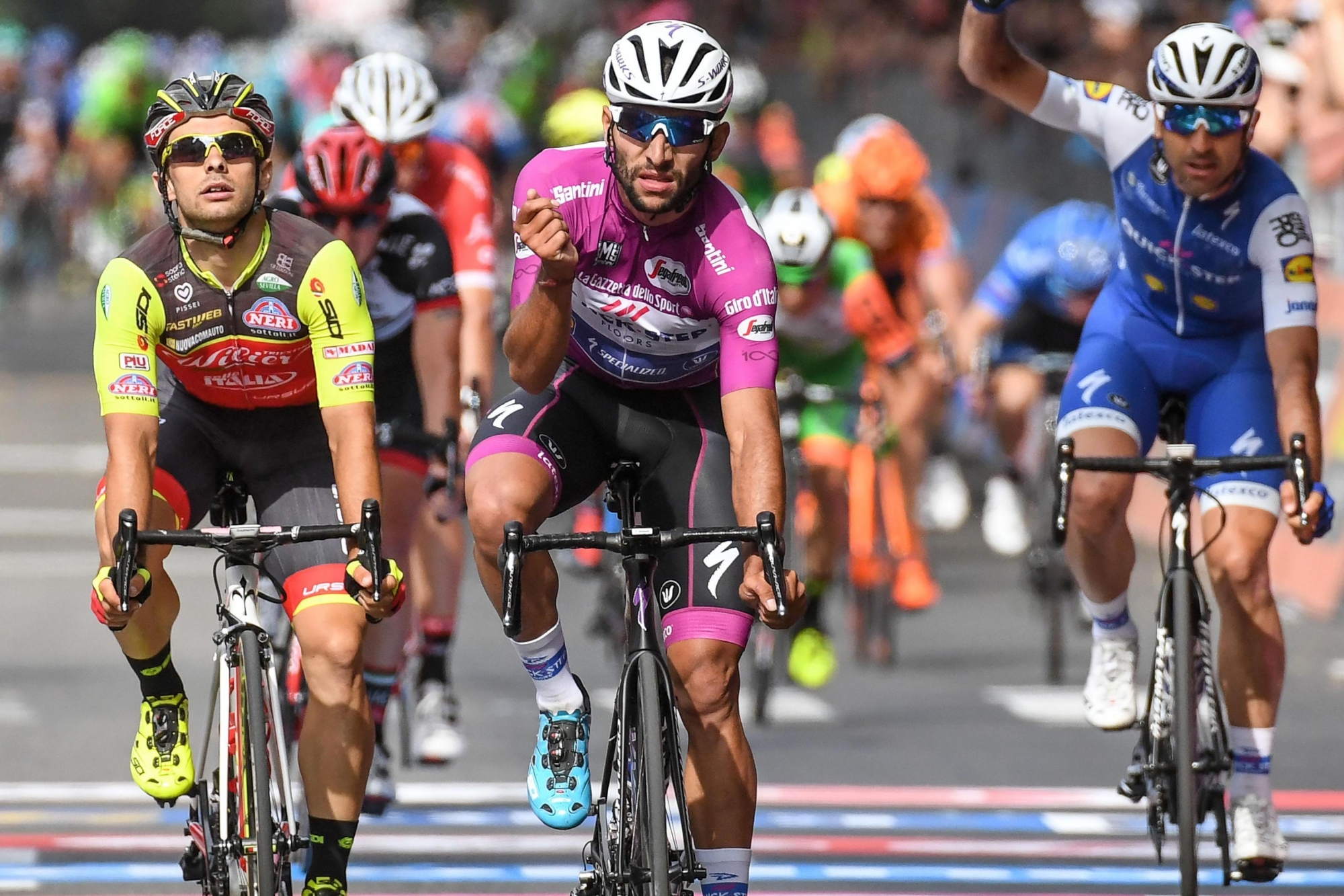 Colombia's Fernando Gaviria crosses the finish line to win the 12th stage of Giro d'Italia, Tour of Italy cycling race, from from Forli to Reggio Emilia, Thursday, May 18, 2017. (Alessandro Di Meo/ANSA via AP) Italy Giro Cycling