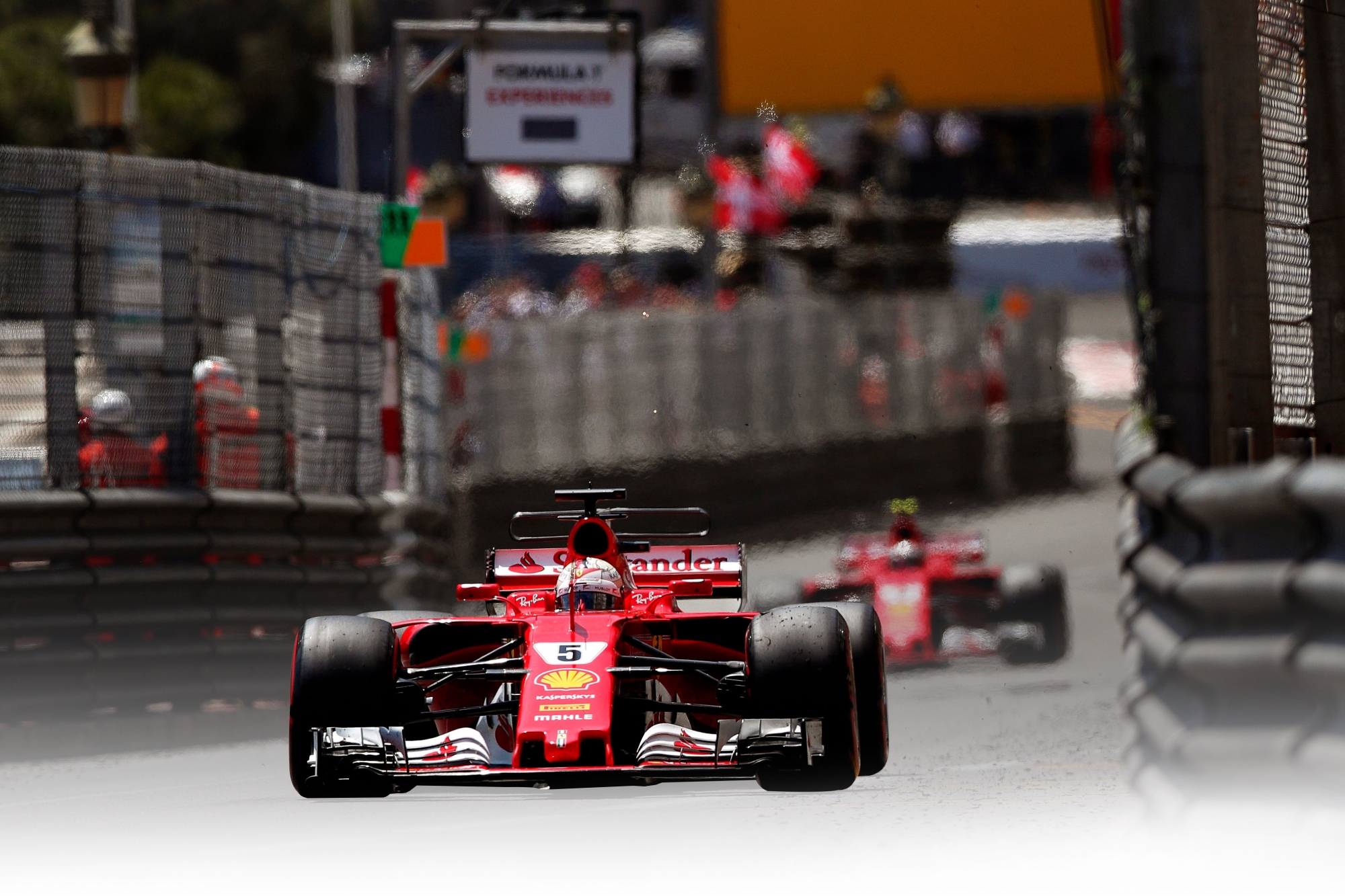 epa05995576 German Formula One driver Sebastian Vettel of Scuderia Ferrari is on his way to win the Monaco Formula One Grand Prix at the Monte Carlo circuit in Monaco, 28 May 2017.  EPA/YOAN VALAT MONACO FORMULA ONE GRAND PRIX