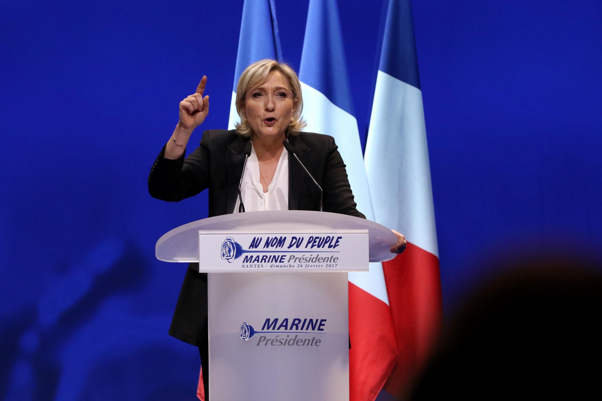 epa05816396 Marine Le Pen, the leader of France's far-right Front National (FN) political party and candidate for the 2017 French presidential elections, delivers a speech during the Front National presidential campaign rally in Nantes, France, 26 February 2017. France holds the first round of the 2017 presidential elections on 23 April 2017.  EPA/EDDY LEMAISTRE FRANCE ELECTIONS PARTIES