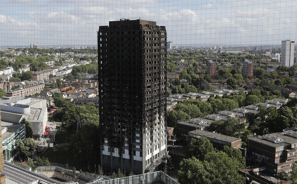 Le sinistre a totalement ravagé la Grenfell Tower, un immeuble d'habitation du quartier populaire de Kensington, dans l'ouest de Londres.