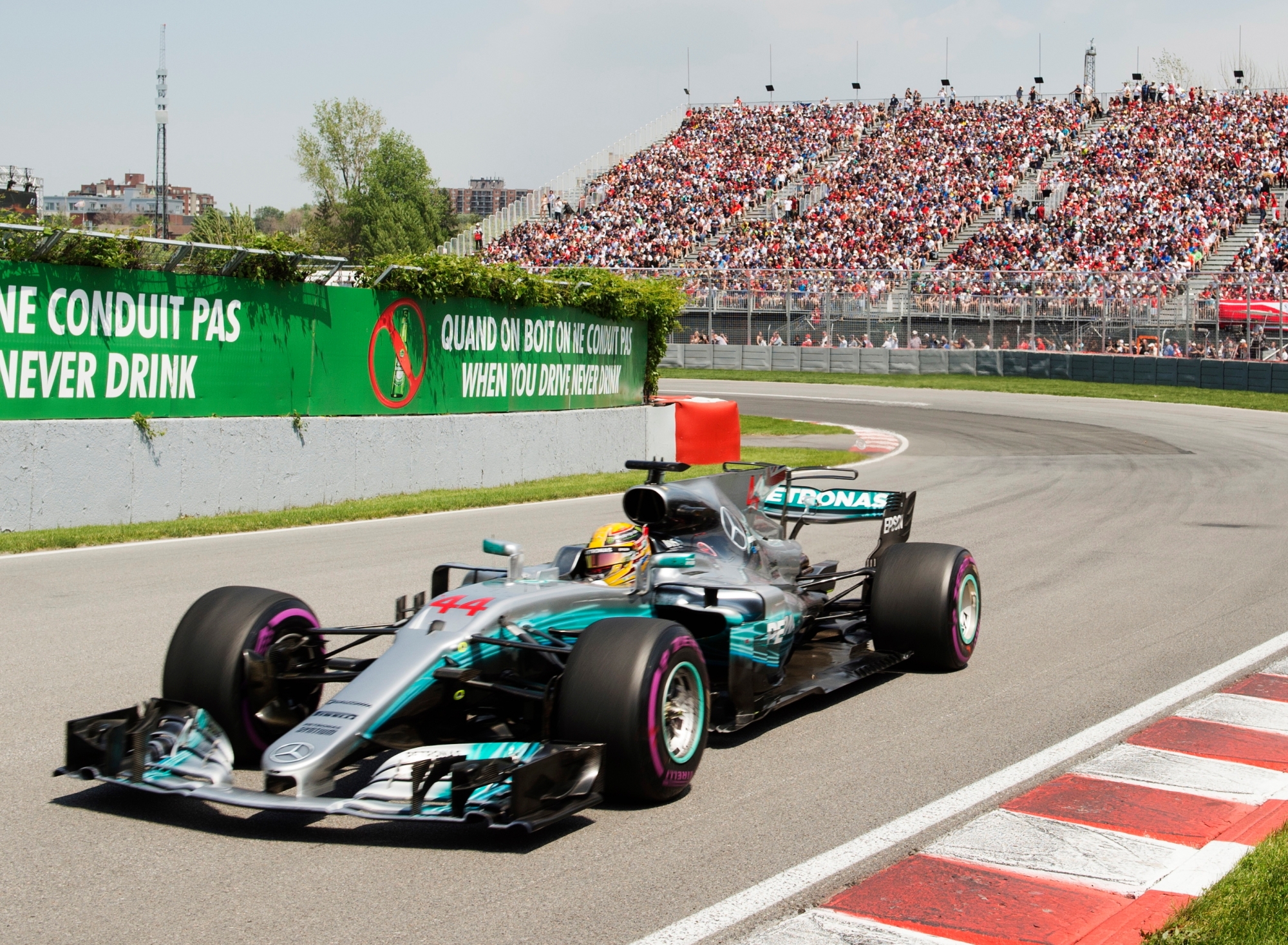 Mercedes driver Lewis Hamilton (44), of Britain, drives through the Senna corner to lead the Canadian Grand Prix, Sunday, June 11, 2017 in Montreal. (Ryan Remiorz/The Canadian Press via AP) F1 Canada Grand Prix Auto Racing