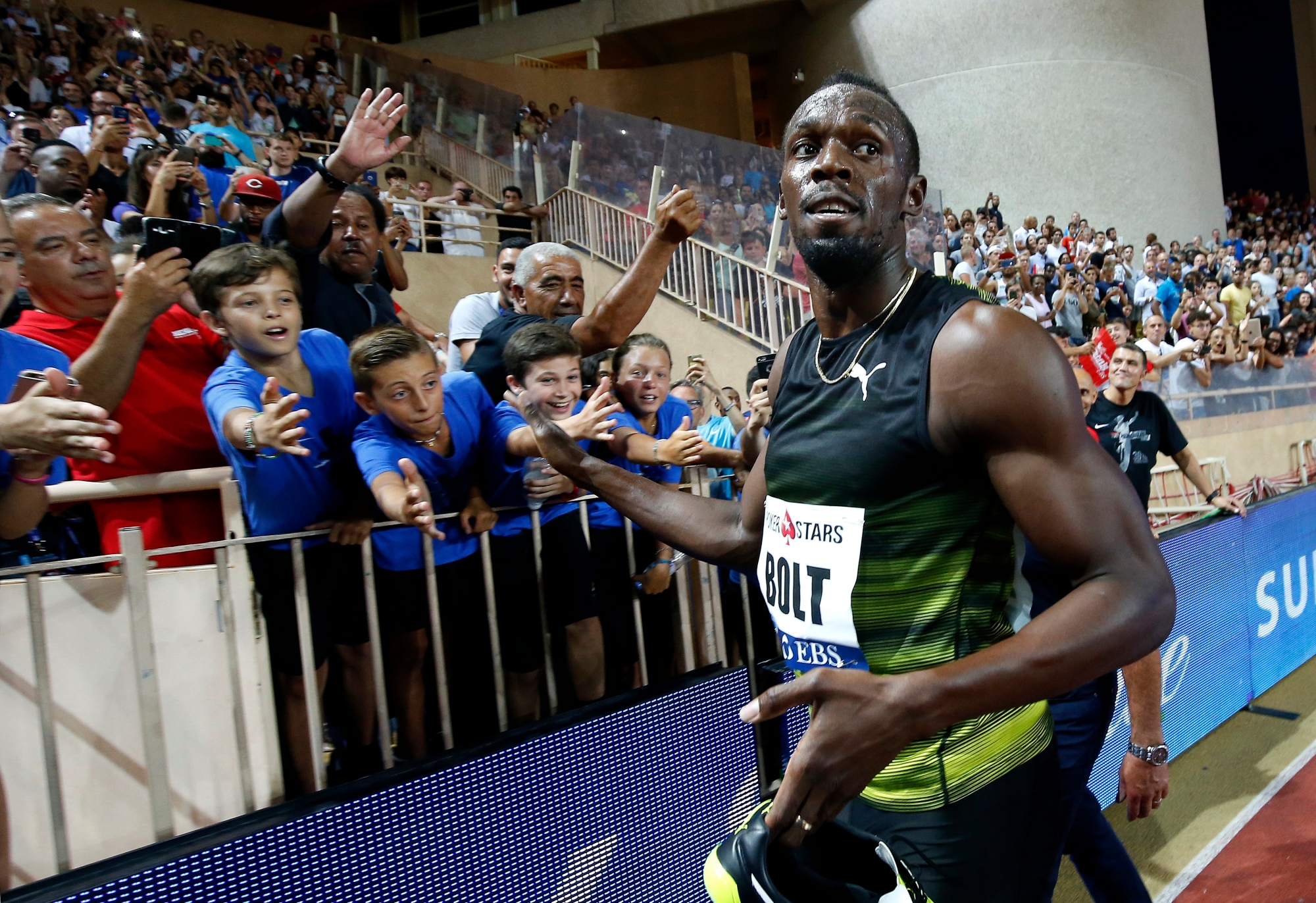 epa06102458 Sprinter Usain Bolt of Jamaica reacts after the men's 100 meters during the IAAF Diamond League meeting at the Stade Louis II in Monaco, 21 July 2017.  EPA/SEBASTIEN NOGIER MONACO ATHLETICS IAAF DIAMOND LEAGUE